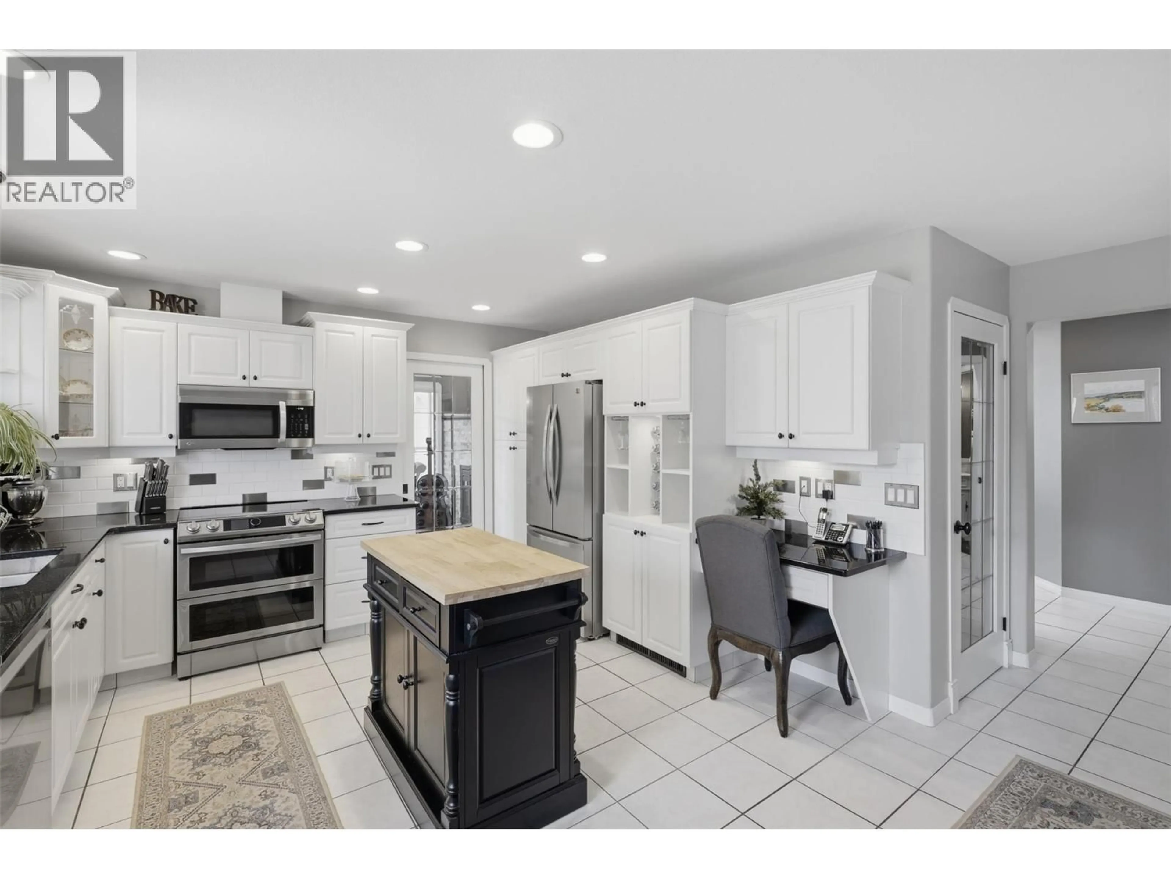 Open concept kitchen, ceramic/tile floor for 906 INVERMERE COURT, Kamloops British Columbia V2B7T4