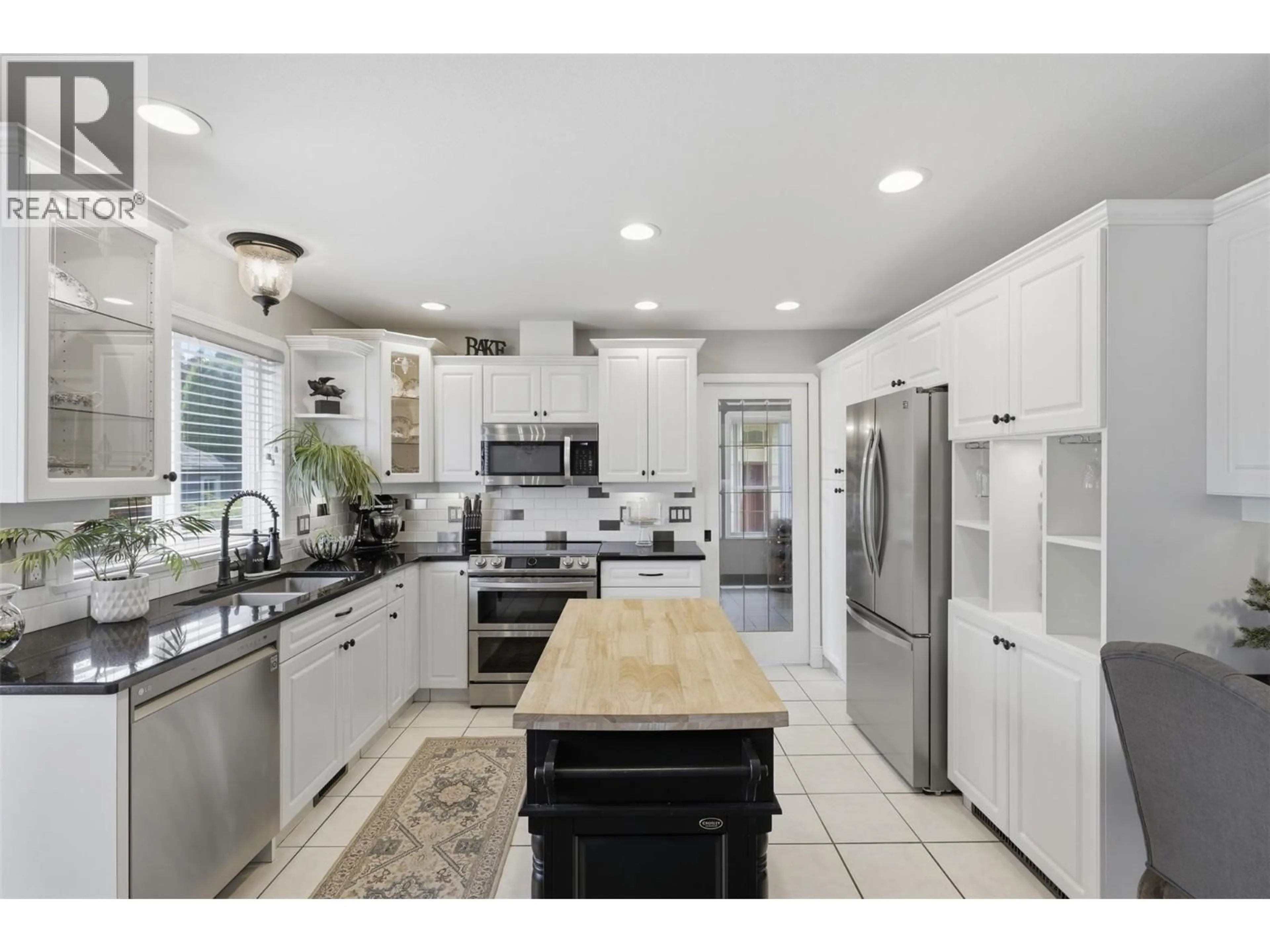 Open concept kitchen, ceramic/tile floor for 906 INVERMERE COURT, Kamloops British Columbia V2B7T4