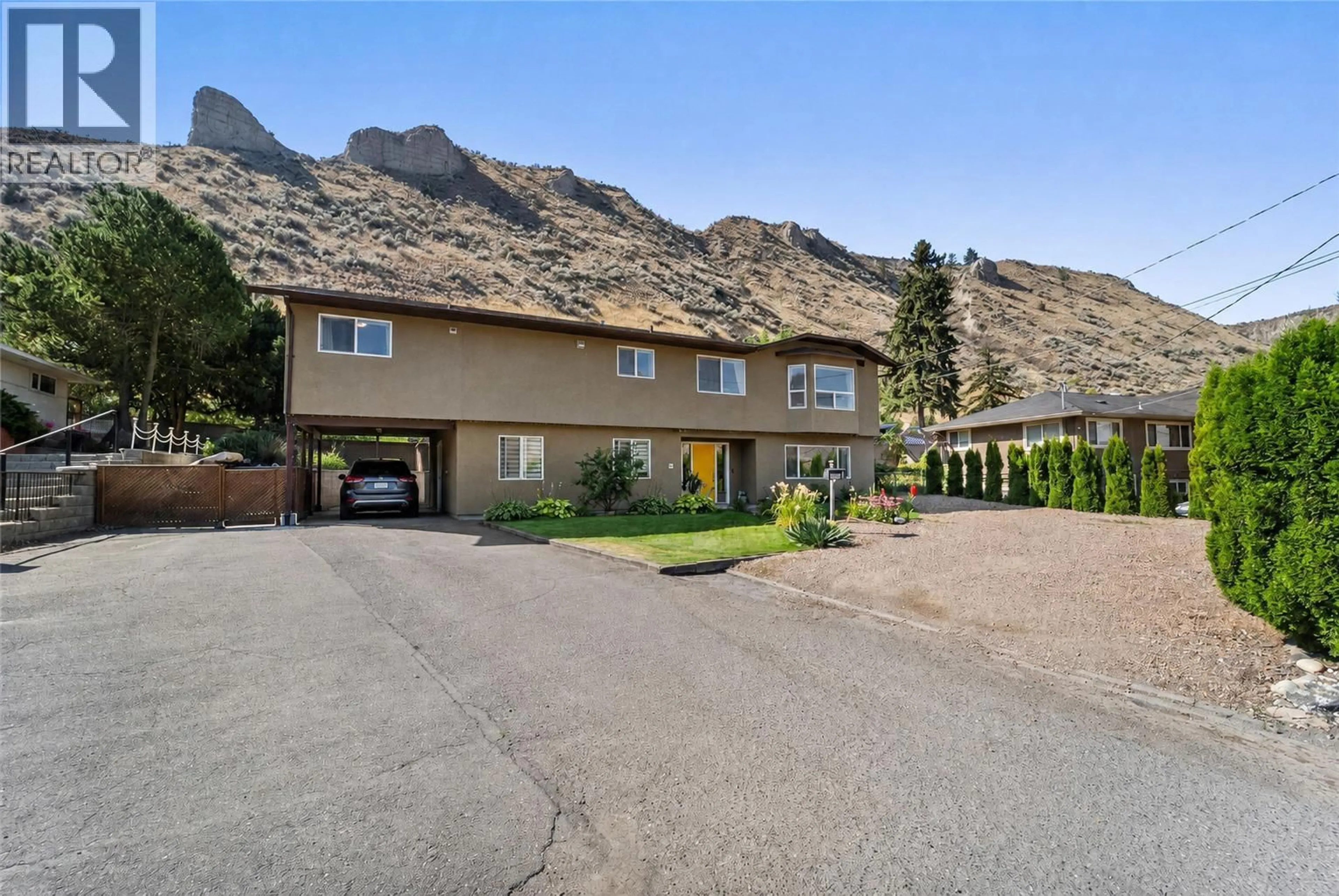 A pic from outside/outdoor area/front of a property/back of a property/a pic from drone, mountain view for 2045 VALLEYVIEW DRIVE, Kamloops British Columbia V2C4C3