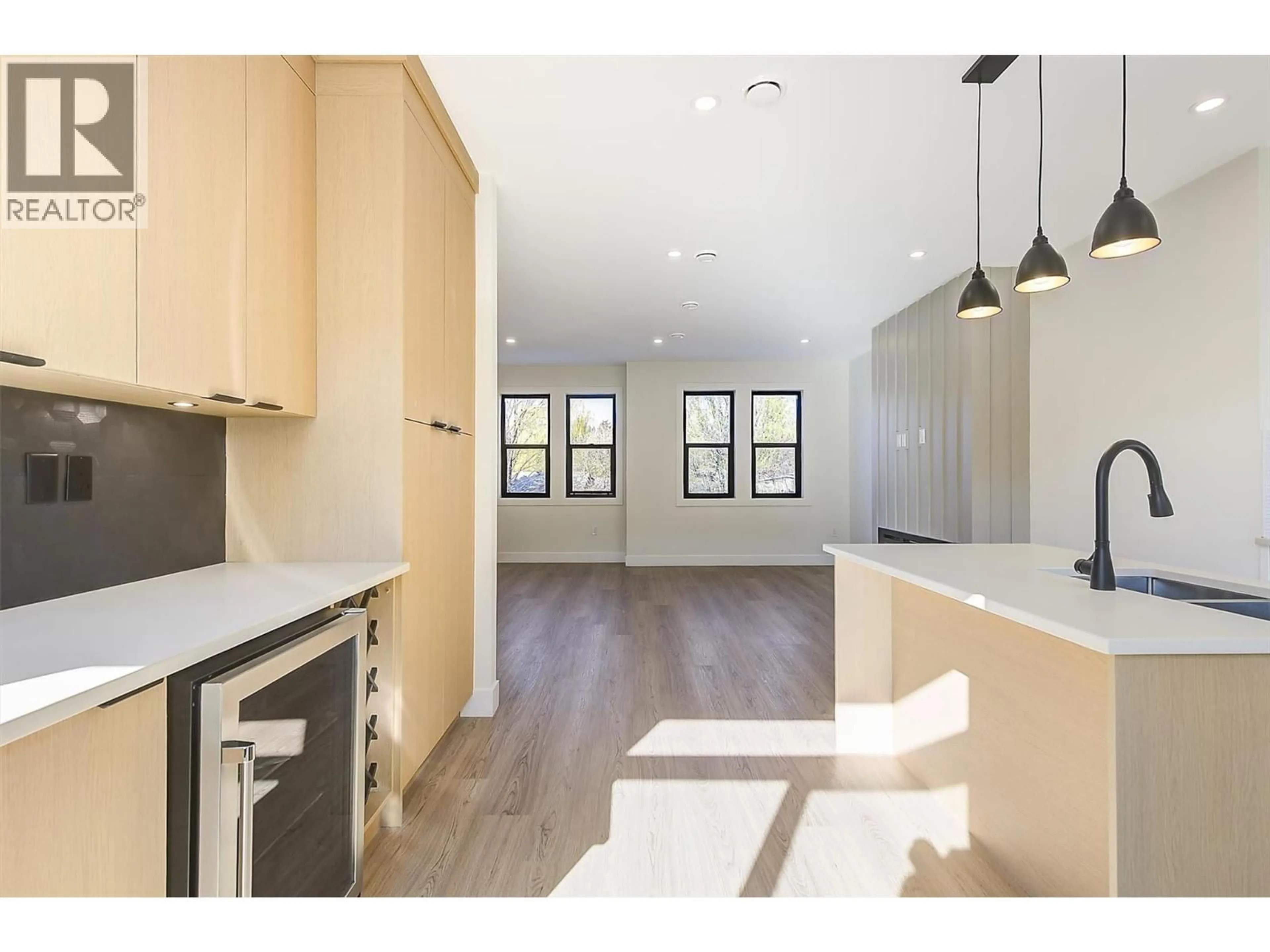 Open concept kitchen, wood/laminate floor for 3 - 3590 REDECOPP ROAD, Lake Country British Columbia V4V1X5