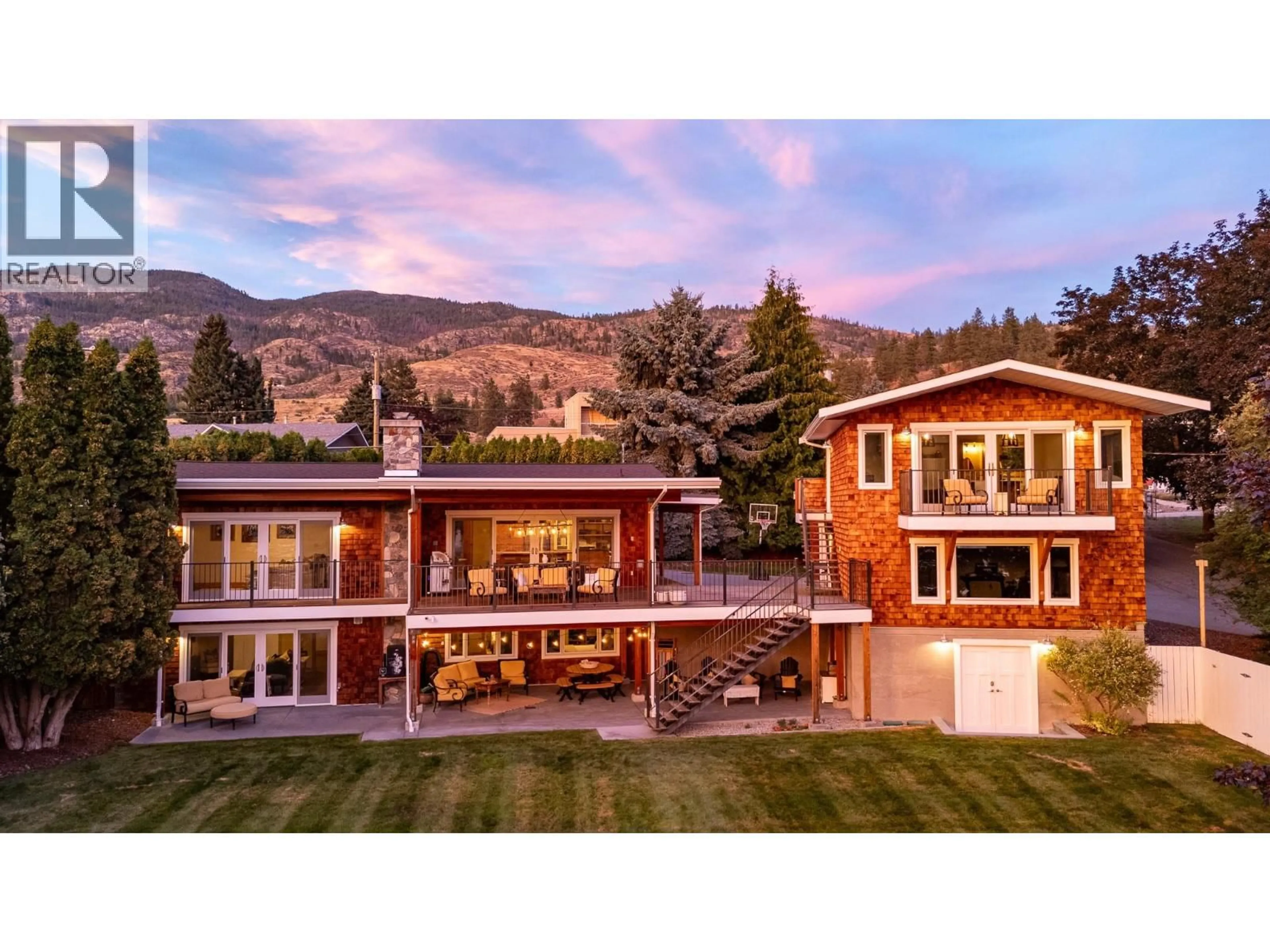 A pic from outside/outdoor area/front of a property/back of a property/a pic from drone, mountain view for 138 DEVON DRIVE, Okanagan Falls British Columbia V0H1R5