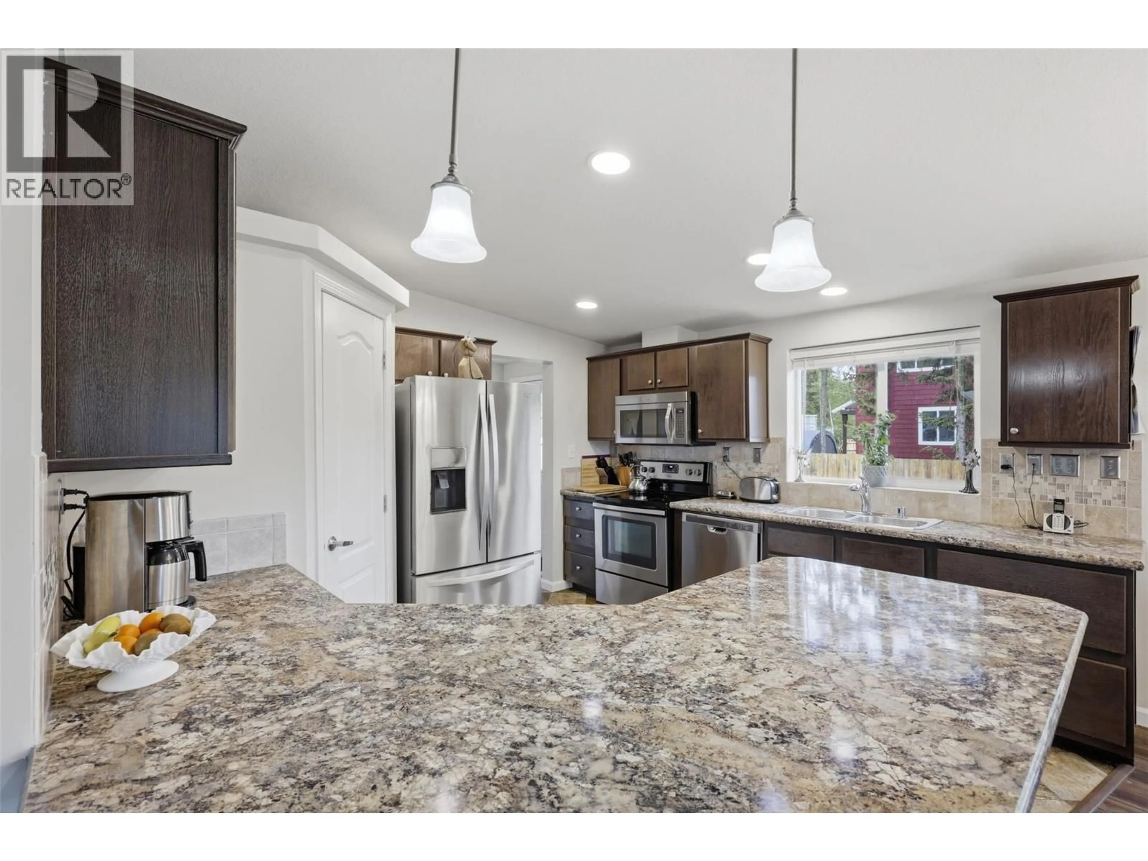 Open concept kitchen, ceramic/tile floor for 3025 POWELL ROAD, Kamloops British Columbia V0E3E1
