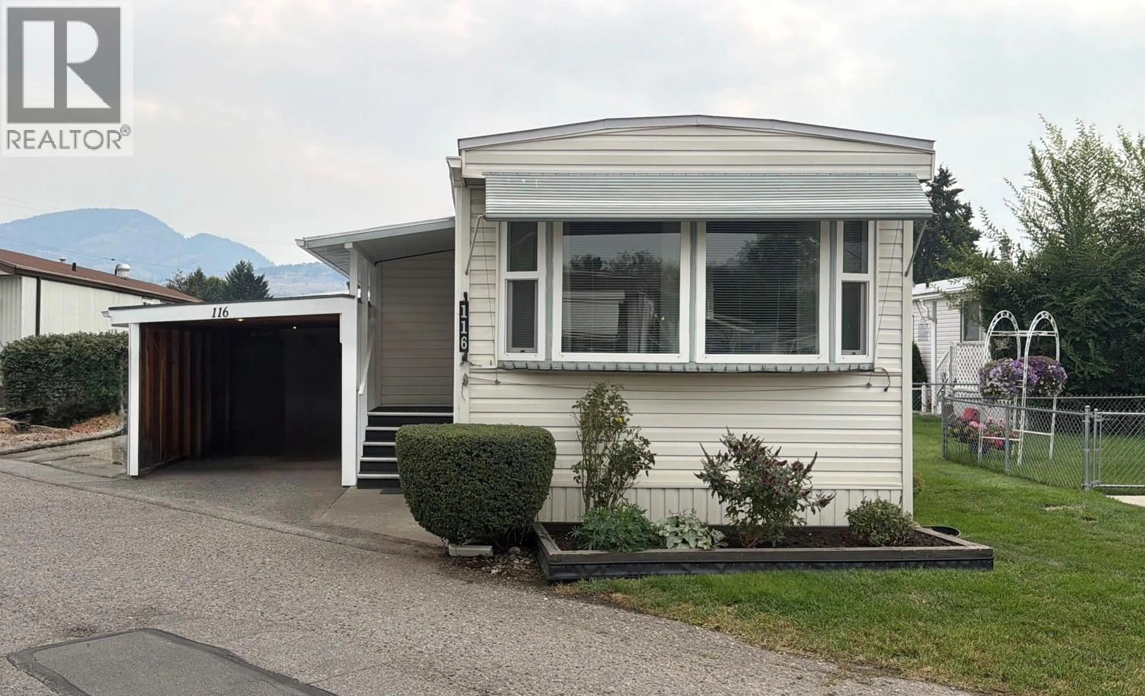 Home with vinyl exterior material, street for 116 - 1133 FINDLAY ROAD, Kelowna British Columbia V1X5A9