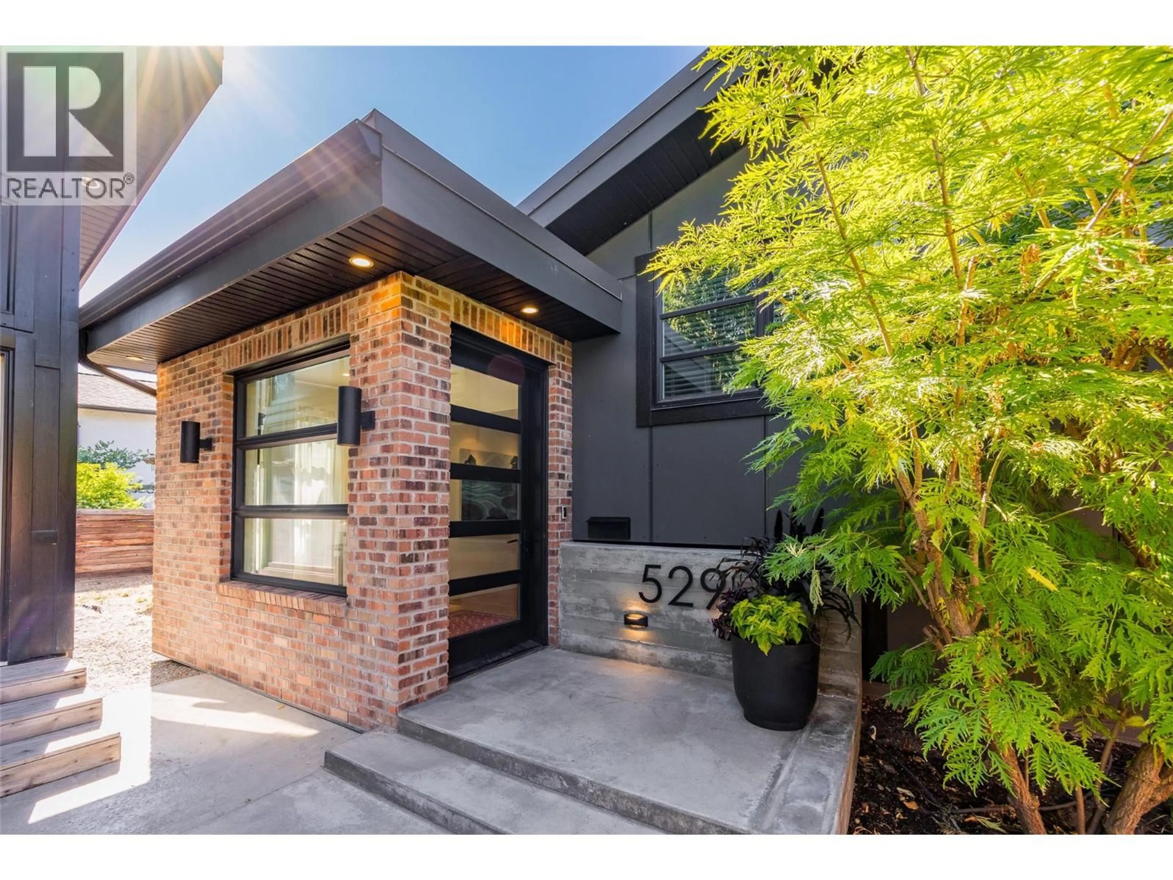 Home with brick exterior material, street for 529 KEITH ROAD, Kelowna British Columbia V1W1K2