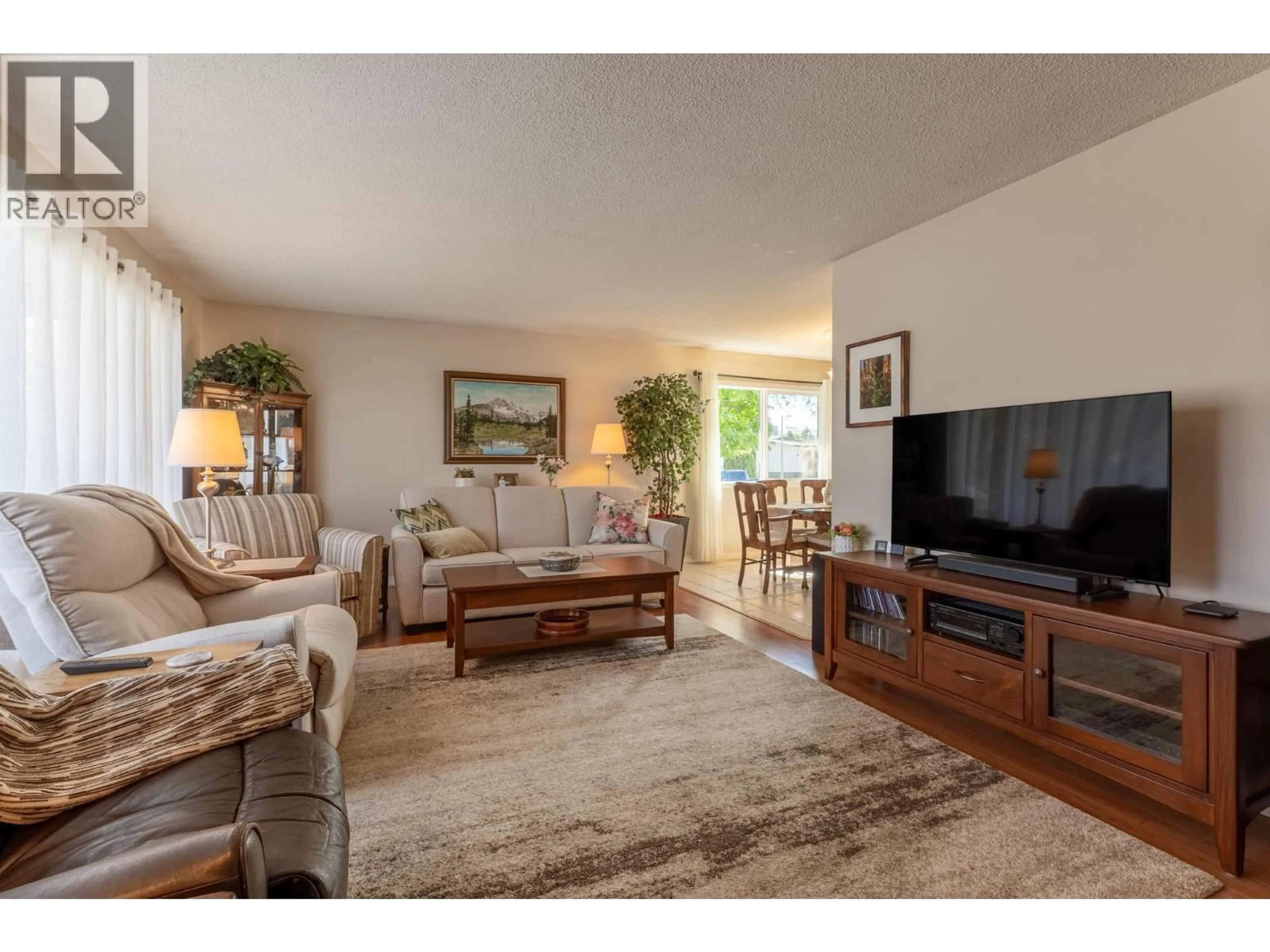 Living room with furniture, unknown for 1306 LOMBARDY SQUARE, Kelowna British Columbia V1Y3S4
