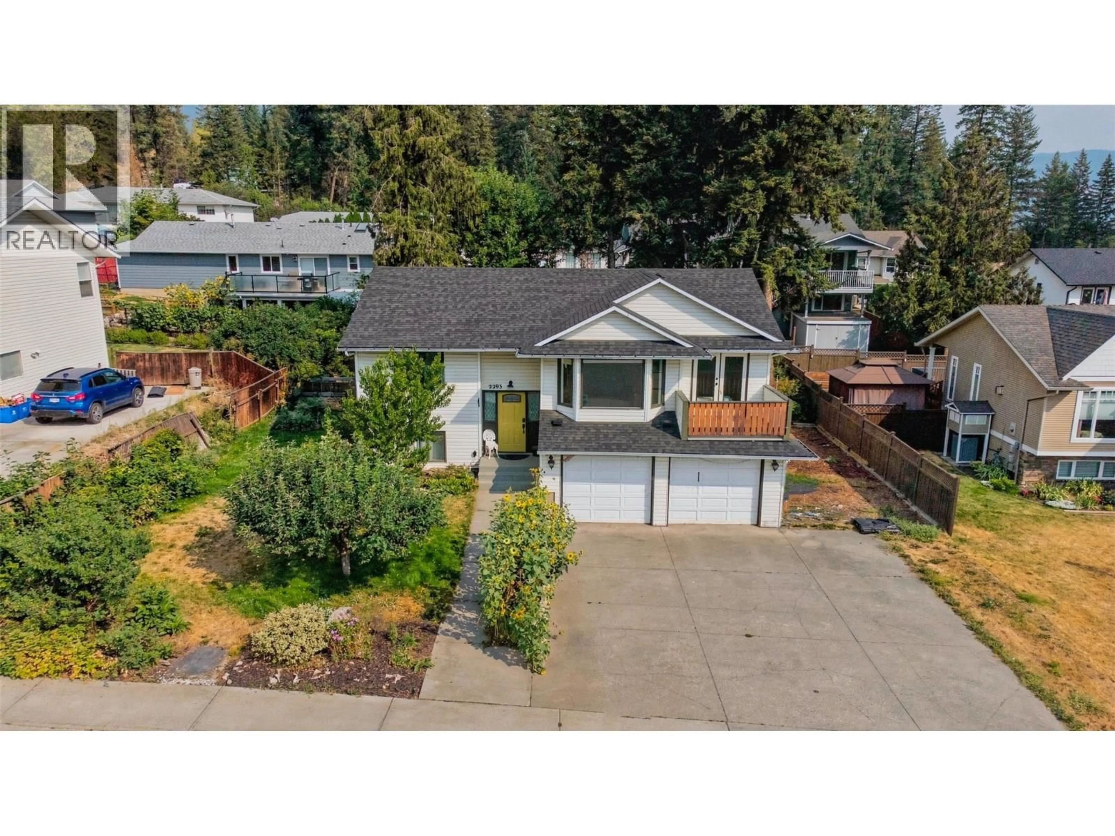 A pic from outside/outdoor area/front of a property/back of a property/a pic from drone, street for 2293 CATT AVENUE, Lumby British Columbia V0E2G0