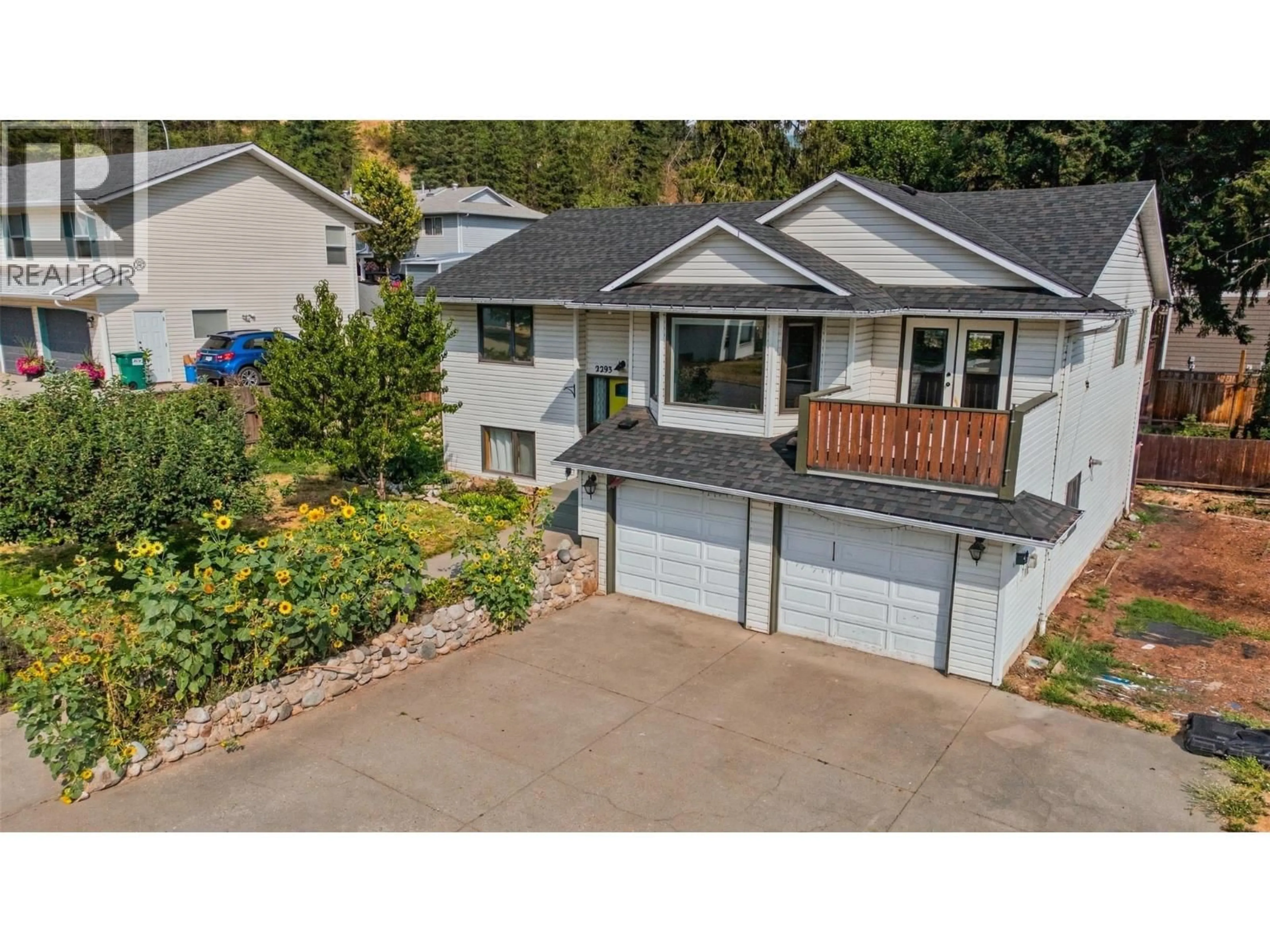 A pic from outside/outdoor area/front of a property/back of a property/a pic from drone, street for 2293 CATT AVENUE, Lumby British Columbia V0E2G0