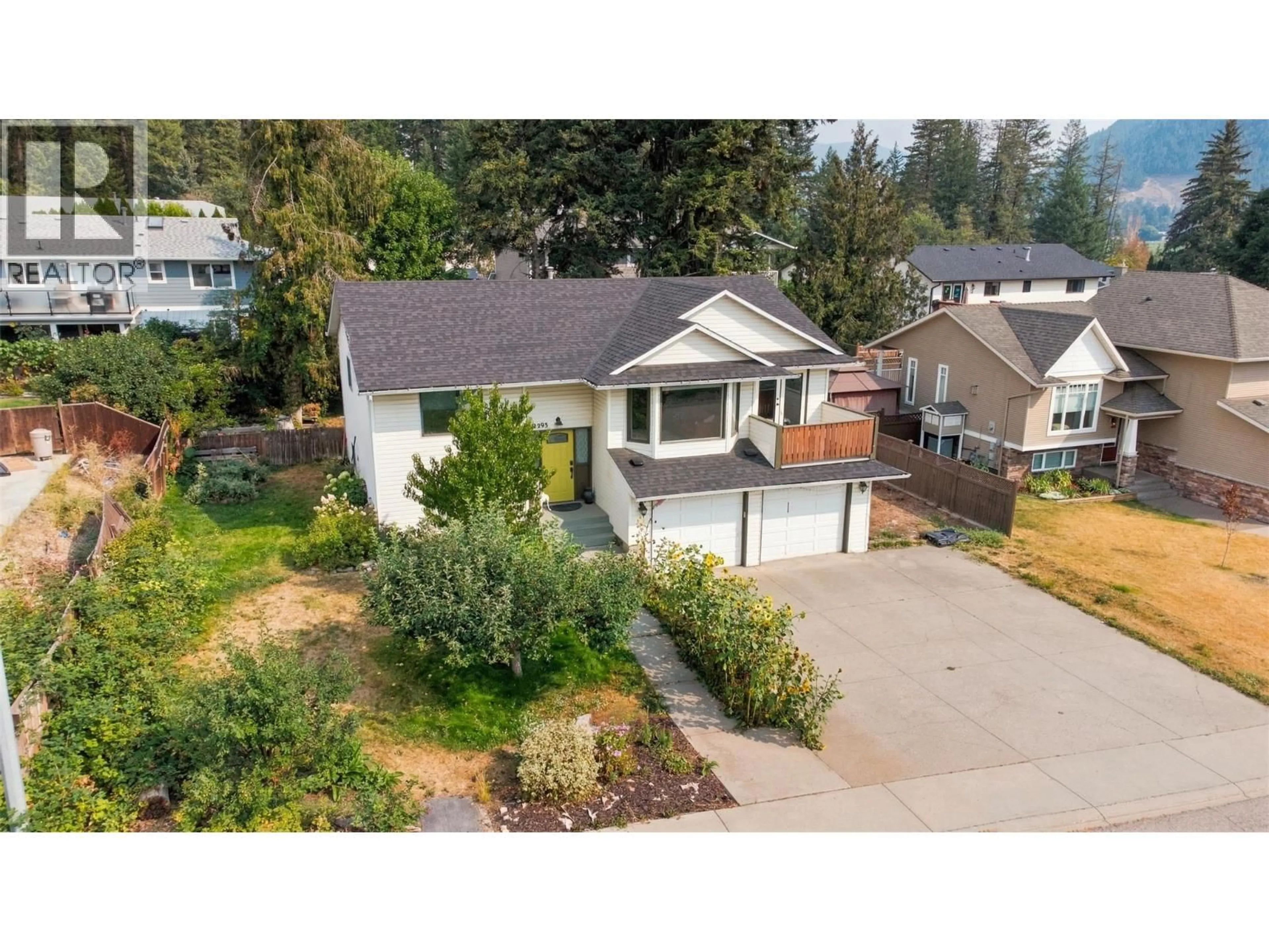 A pic from outside/outdoor area/front of a property/back of a property/a pic from drone, street for 2293 CATT AVENUE, Lumby British Columbia V0E2G0