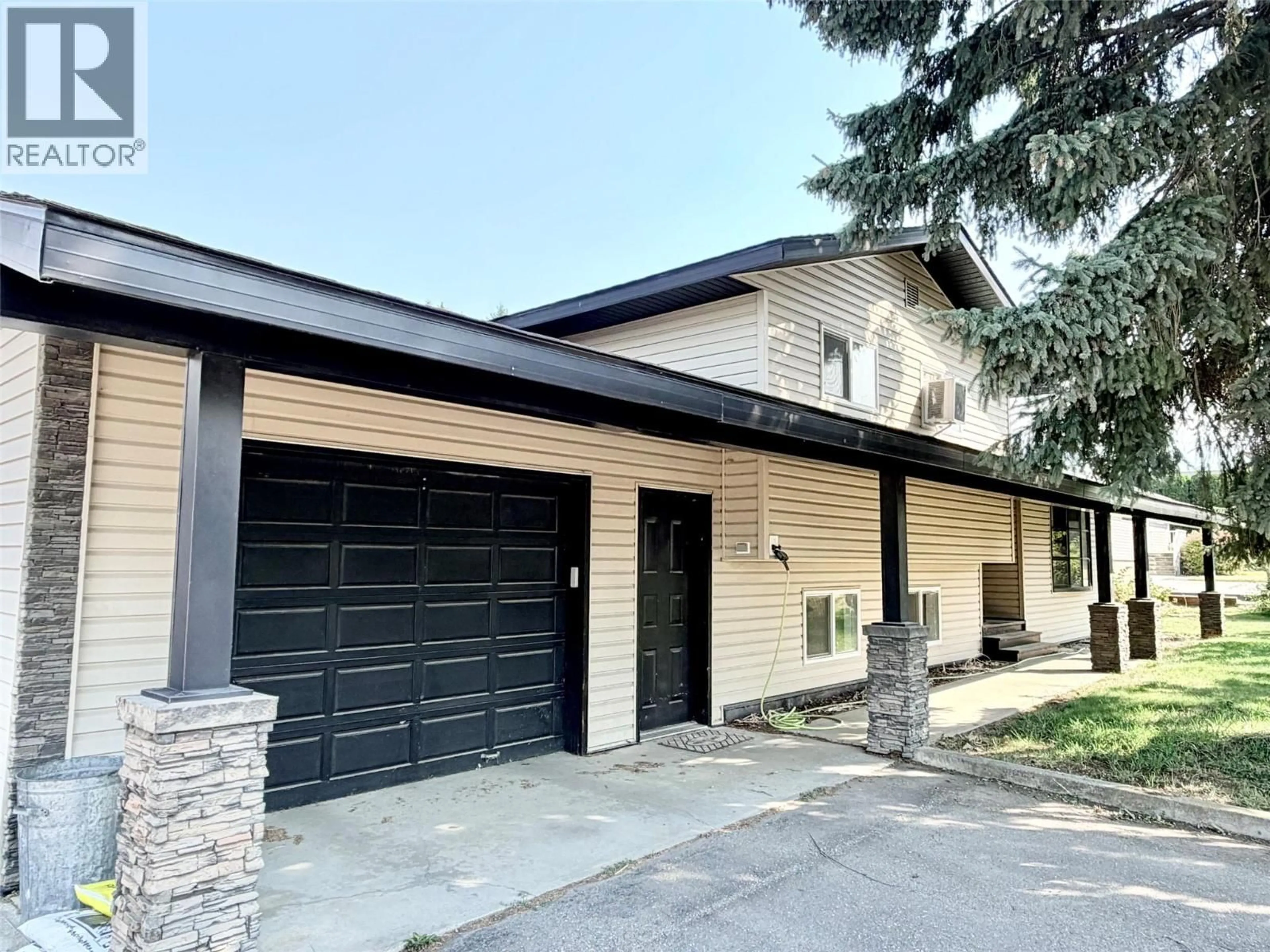 Home with brick exterior material, street for 1804 ELM STREET, Creston British Columbia V0B1G5