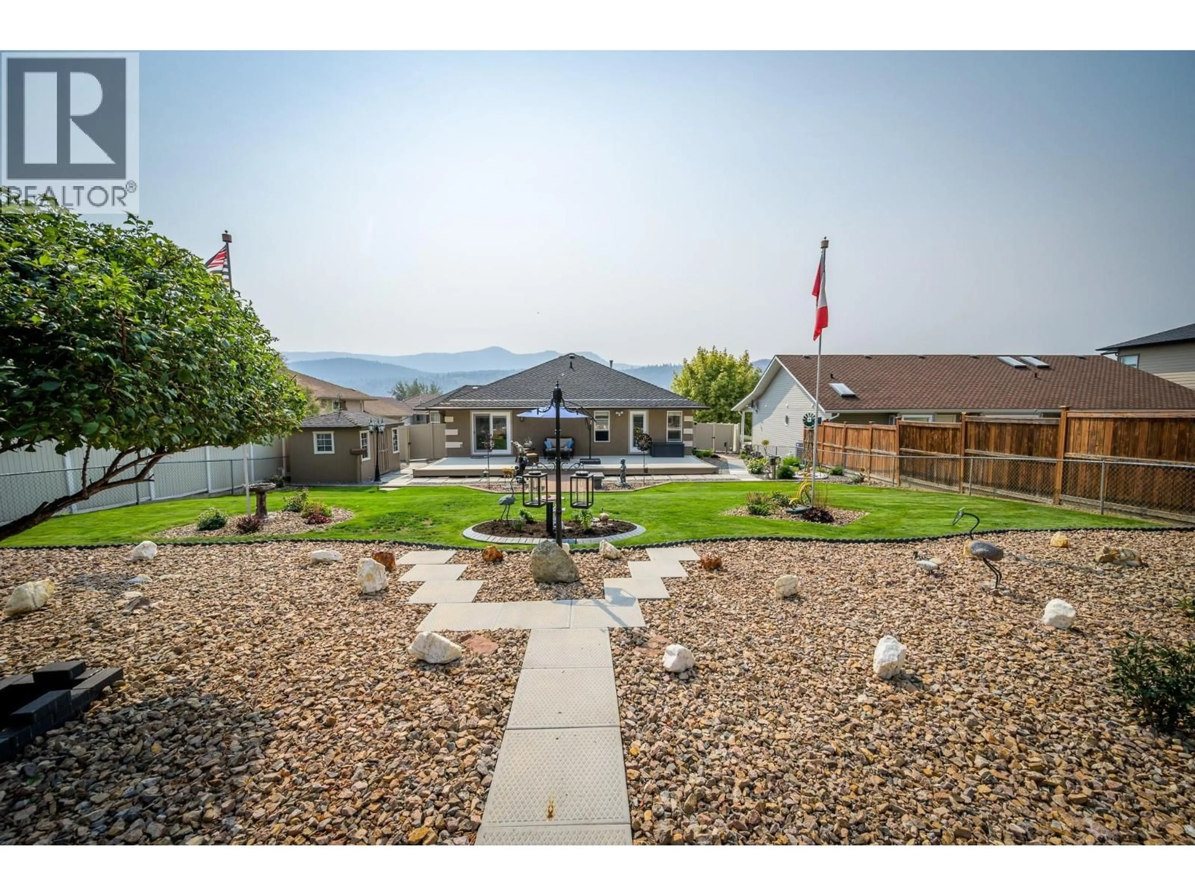 A pic from outside/outdoor area/front of a property/back of a property/a pic from drone, mountain view for 3577 NAVATANEE DRIVE, Kamloops British Columbia V2H1S1