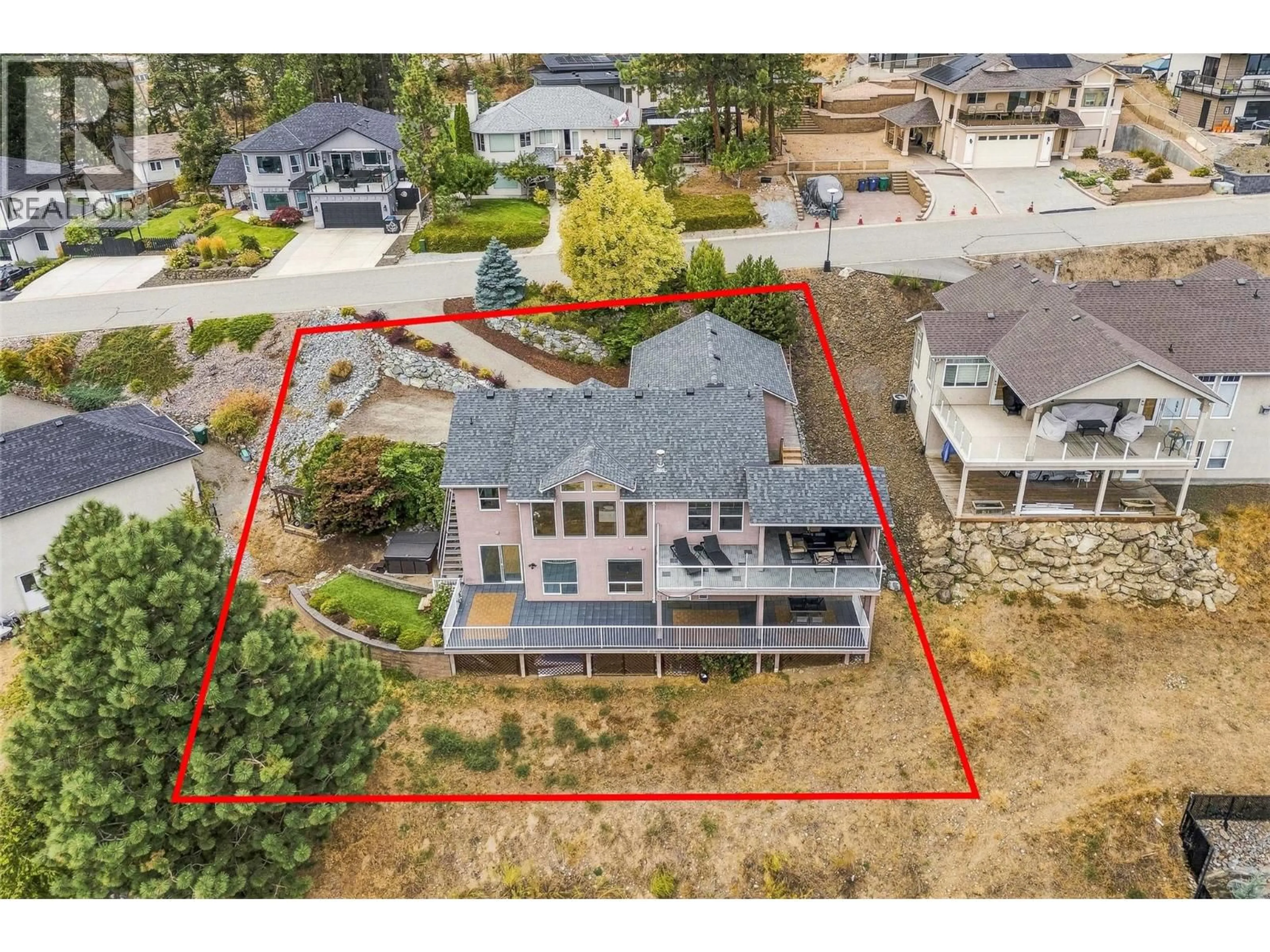 A pic from outside/outdoor area/front of a property/back of a property/a pic from drone, street for 14 - 1525 BEAR CREEK ROAD, Kelowna British Columbia V1Z3R6