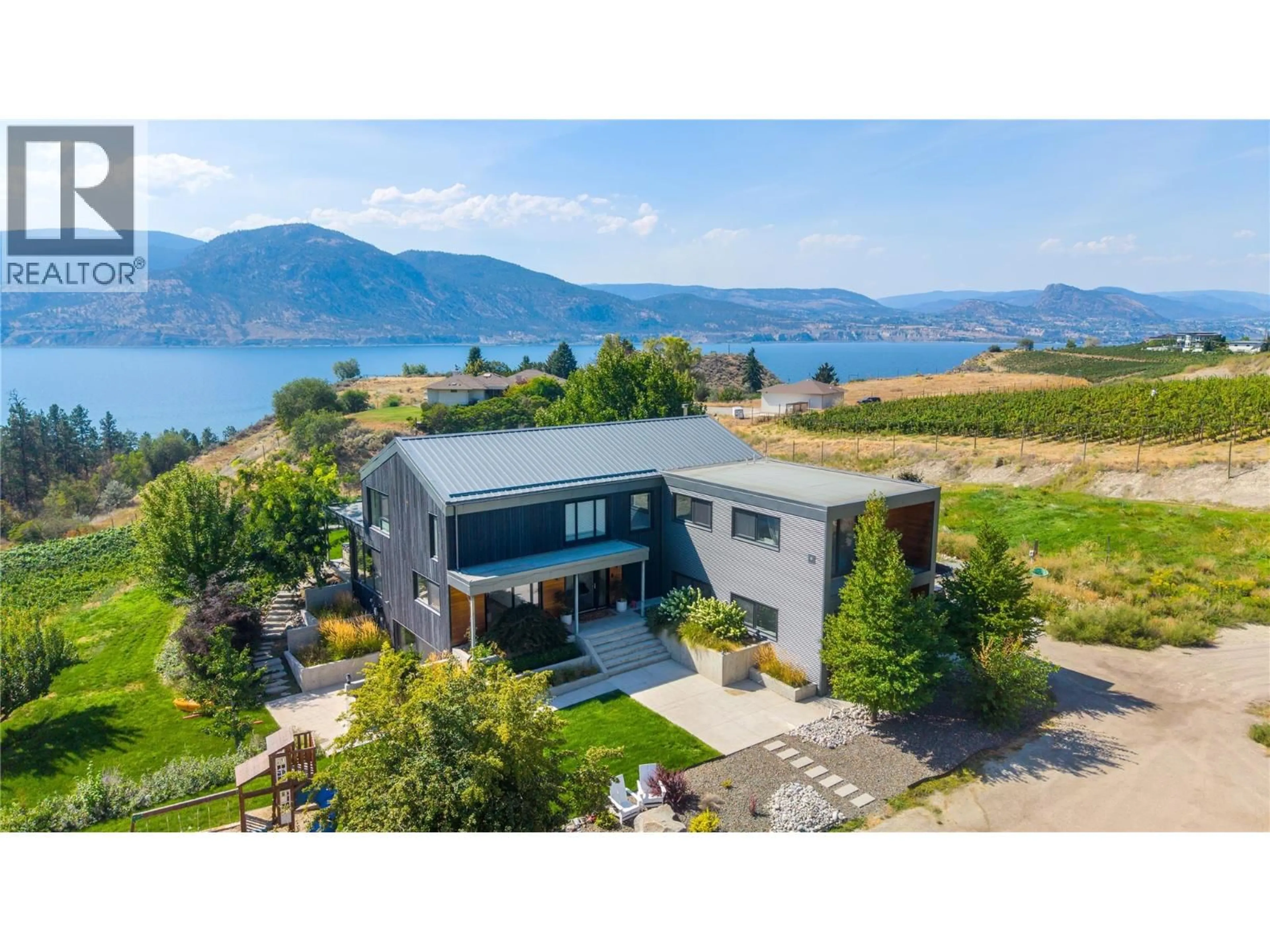 A pic from outside/outdoor area/front of a property/back of a property/a pic from drone, water/lake/river/ocean view for 1053 OHLHAUSEN ROAD, Penticton British Columbia V2A8T6