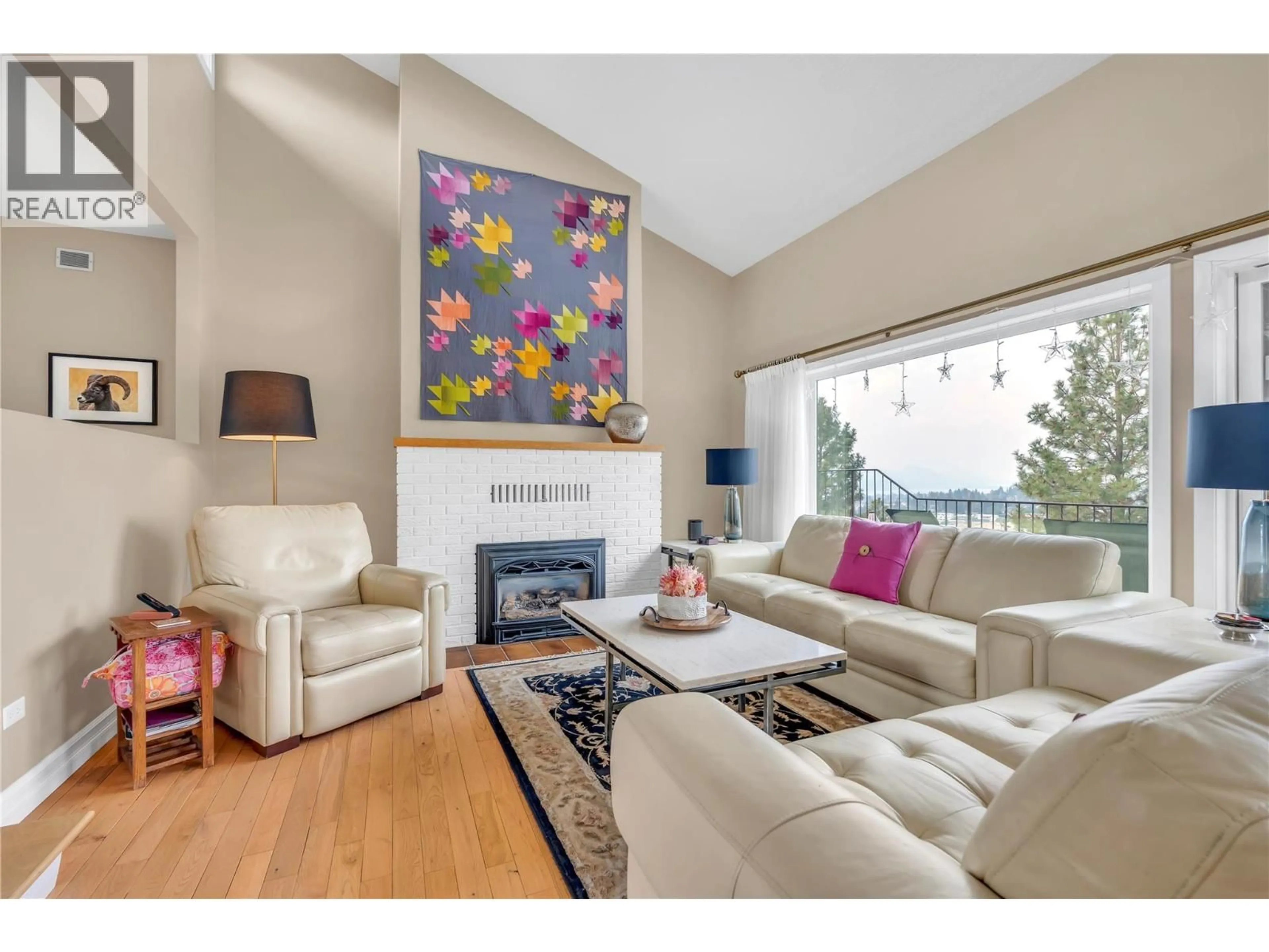 Living room with furniture, wood/laminate floor for 162 WESTVIEW PLACE, Penticton British Columbia V2A7W2