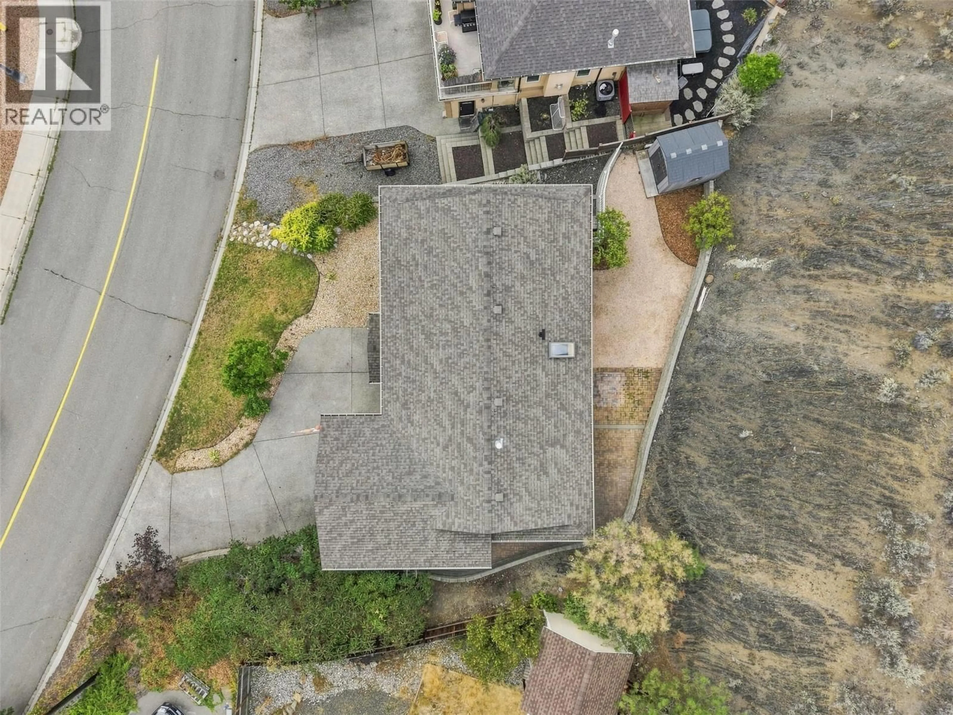 A pic from outside/outdoor area/front of a property/back of a property/a pic from drone, street for 992 PINE SPRINGS ROAD, Kamloops British Columbia V2B8H2