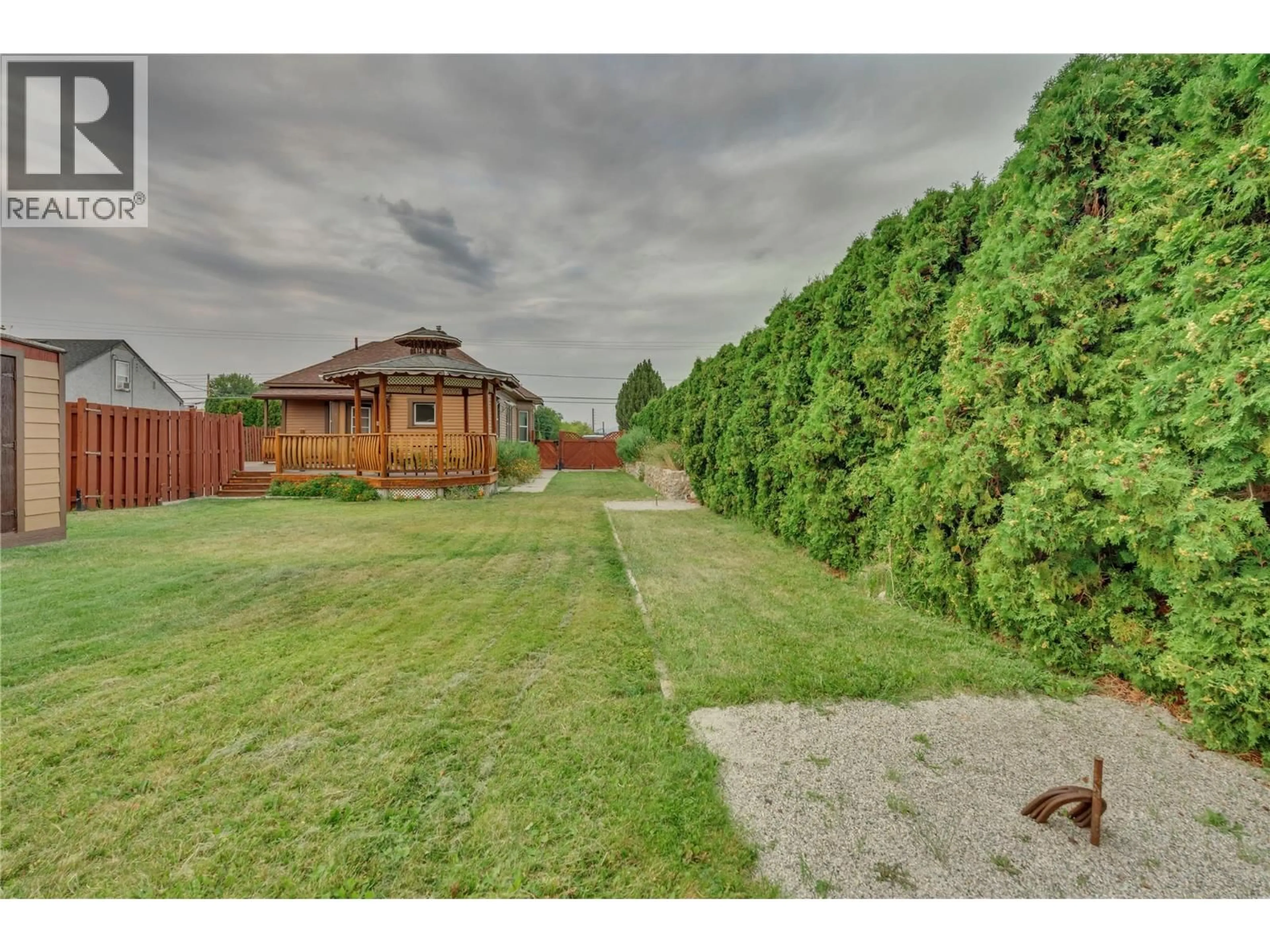 A pic from outside/outdoor area/front of a property/back of a property/a pic from drone, street for 10511 ELLIOTT STREET, Summerland British Columbia V0H1Z2