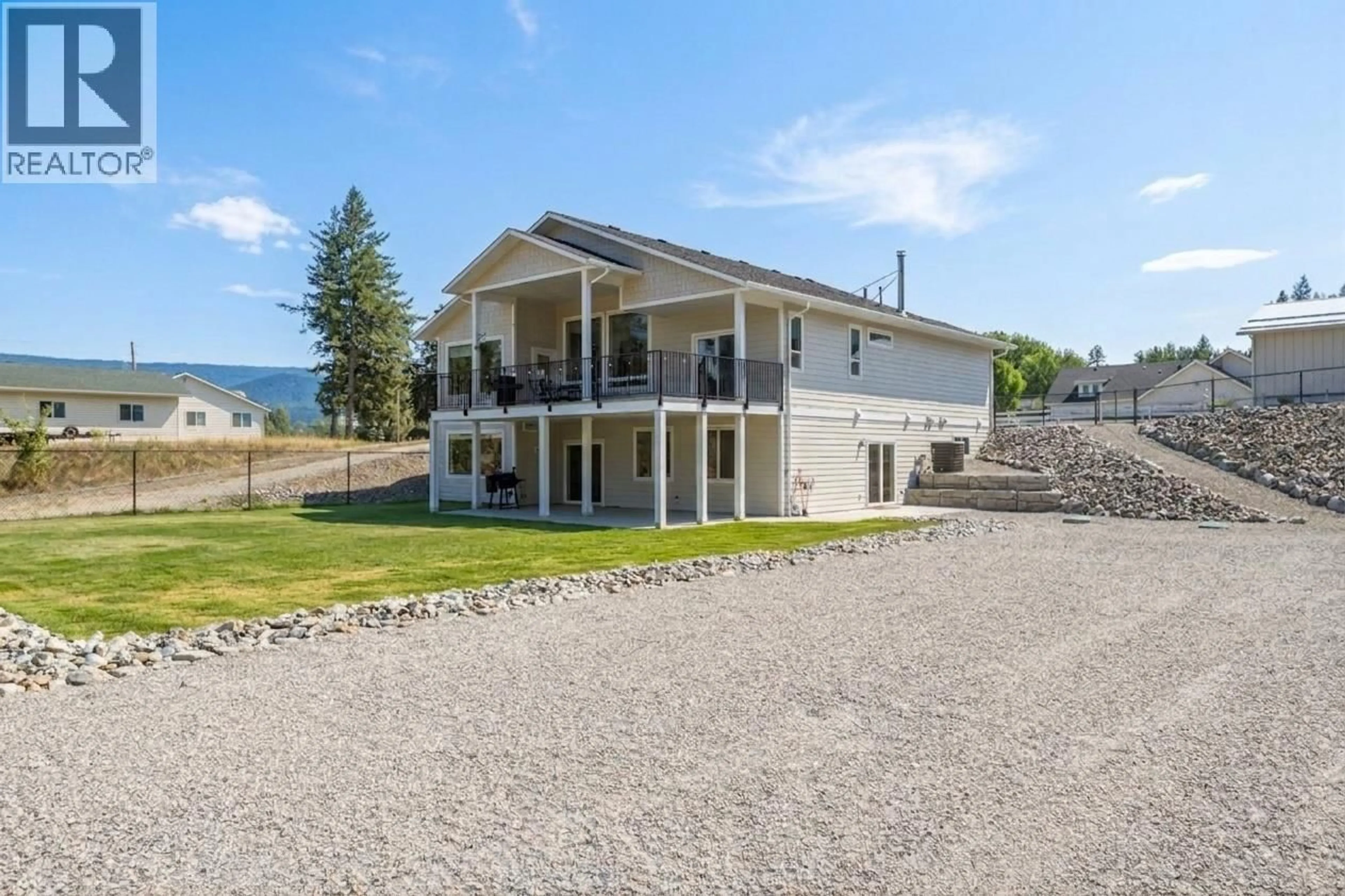 A pic from outside/outdoor area/front of a property/back of a property/a pic from drone, water/lake/river/ocean view for 5531 6 HIGHWAY, Coldstream British Columbia V1B3E2