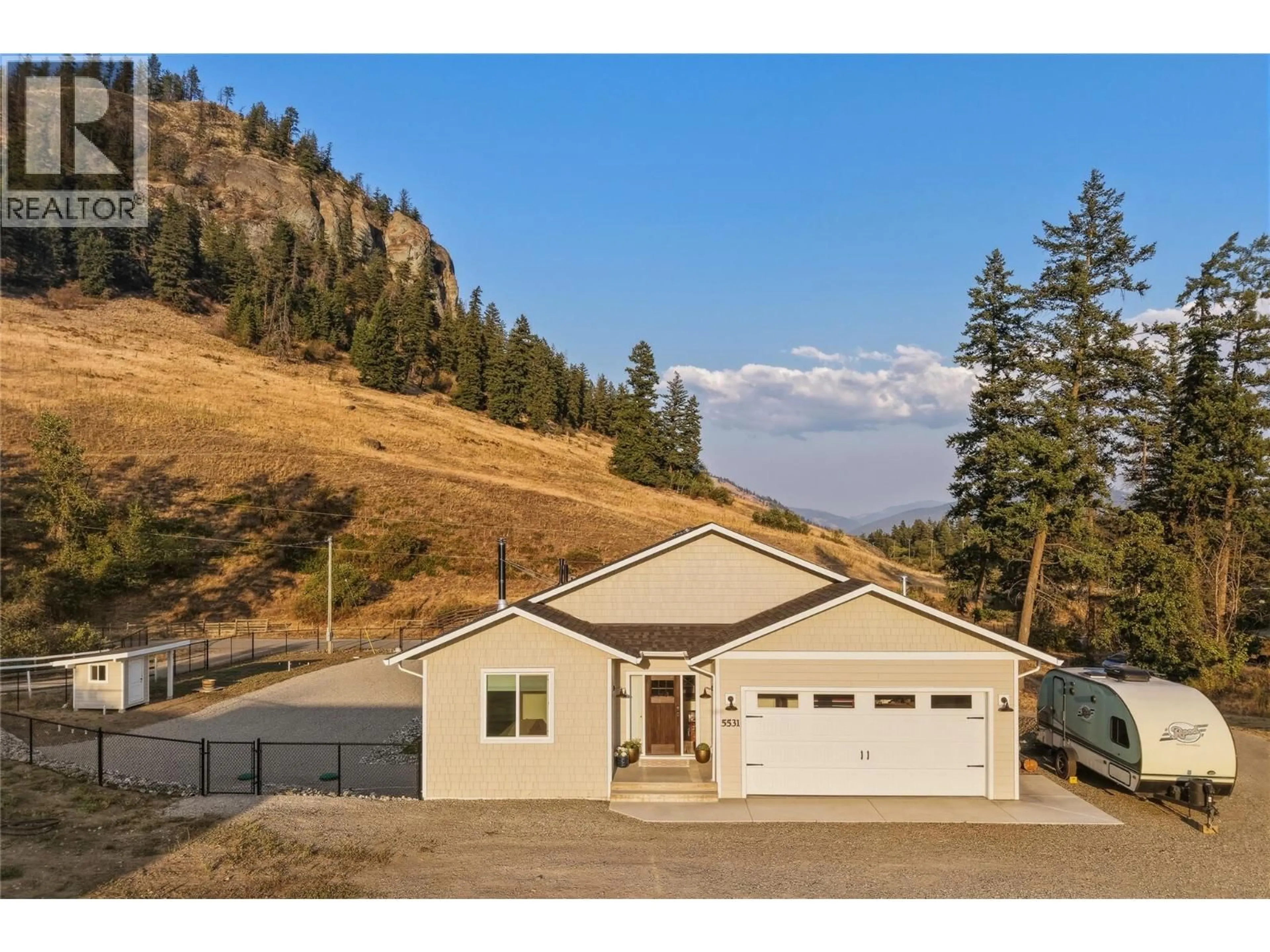 Home with vinyl exterior material, mountain view for 5531 6 HIGHWAY, Coldstream British Columbia V1B3E2