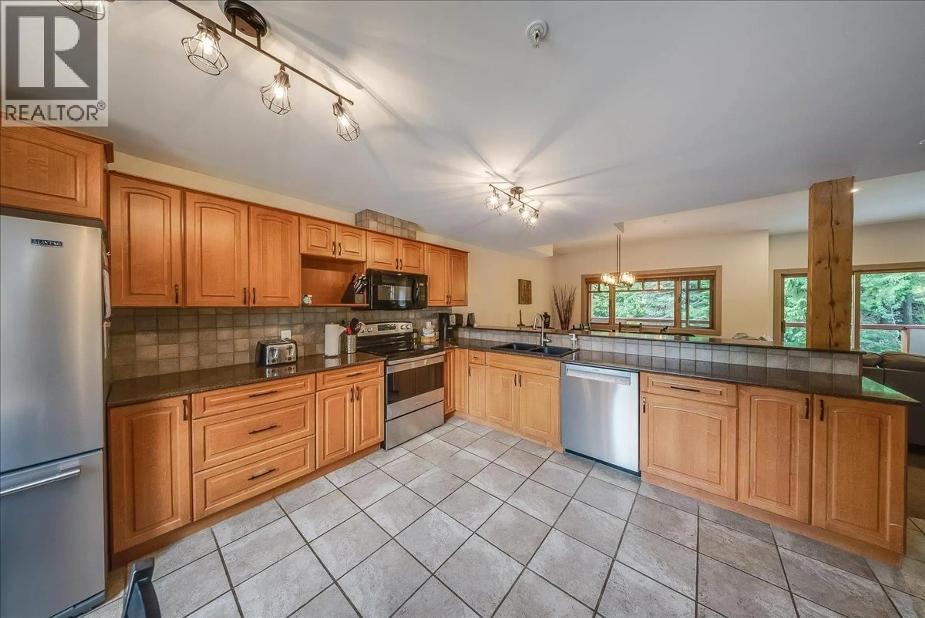 Open concept kitchen, ceramic/tile floor for E - 1003 MOUNTAIN VIEW ROAD, Rossland British Columbia V0G1Y0