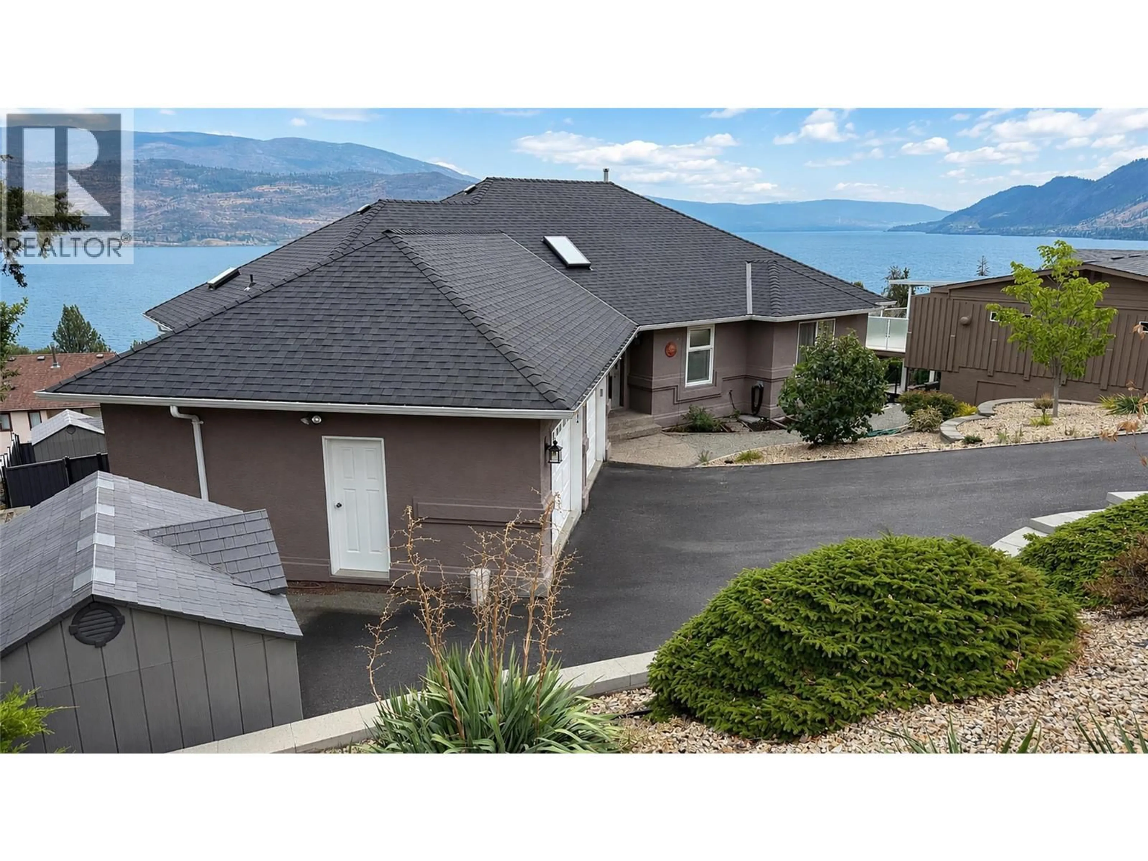 Home with vinyl exterior material, mountain view for 6519 SHERBURN ROAD, Peachland British Columbia V0H1X0