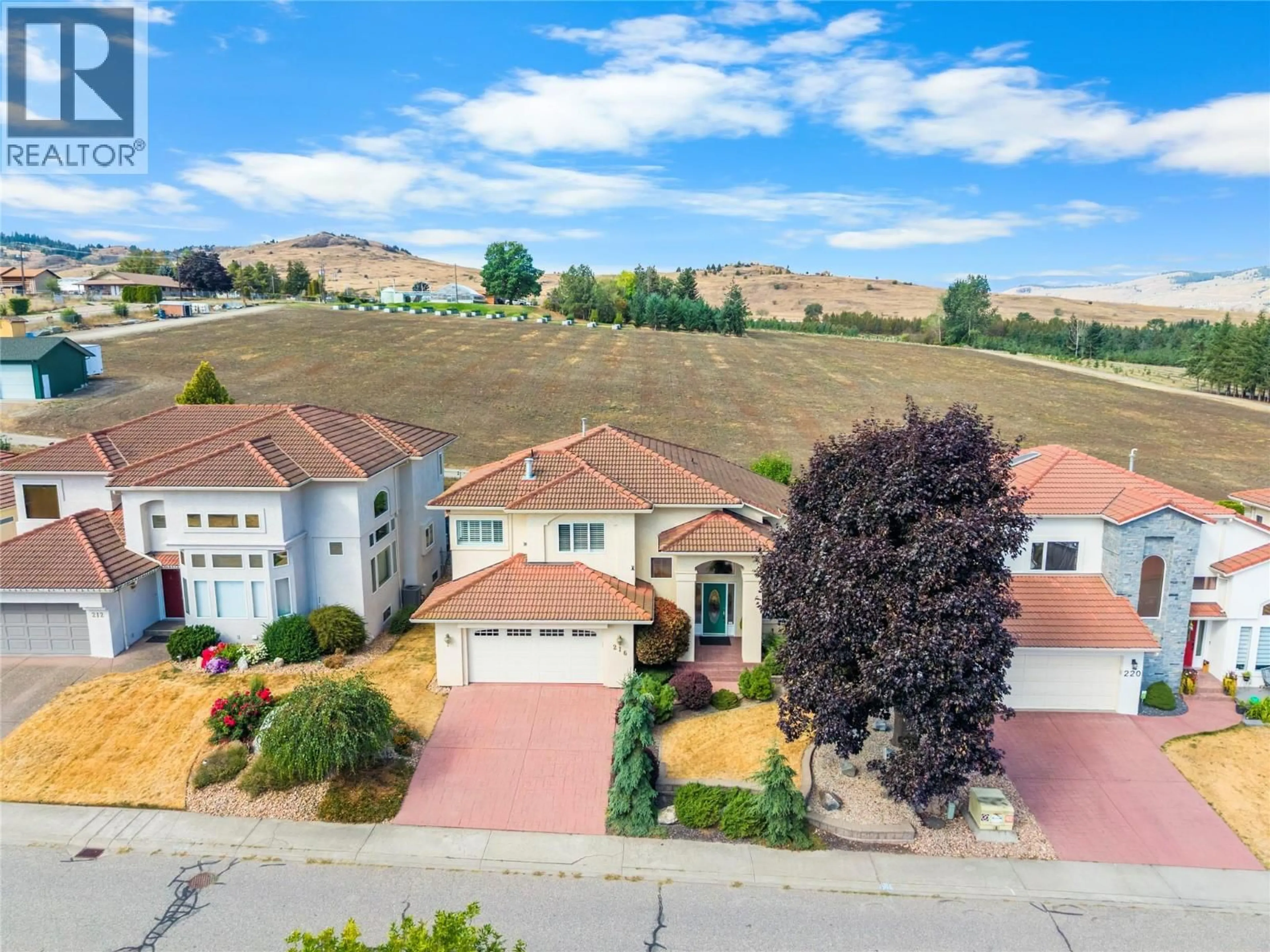 A pic from outside/outdoor area/front of a property/back of a property/a pic from drone, unknown for 216 COUNTRY ESTATE DRIVE, Vernon British Columbia V1B2V2