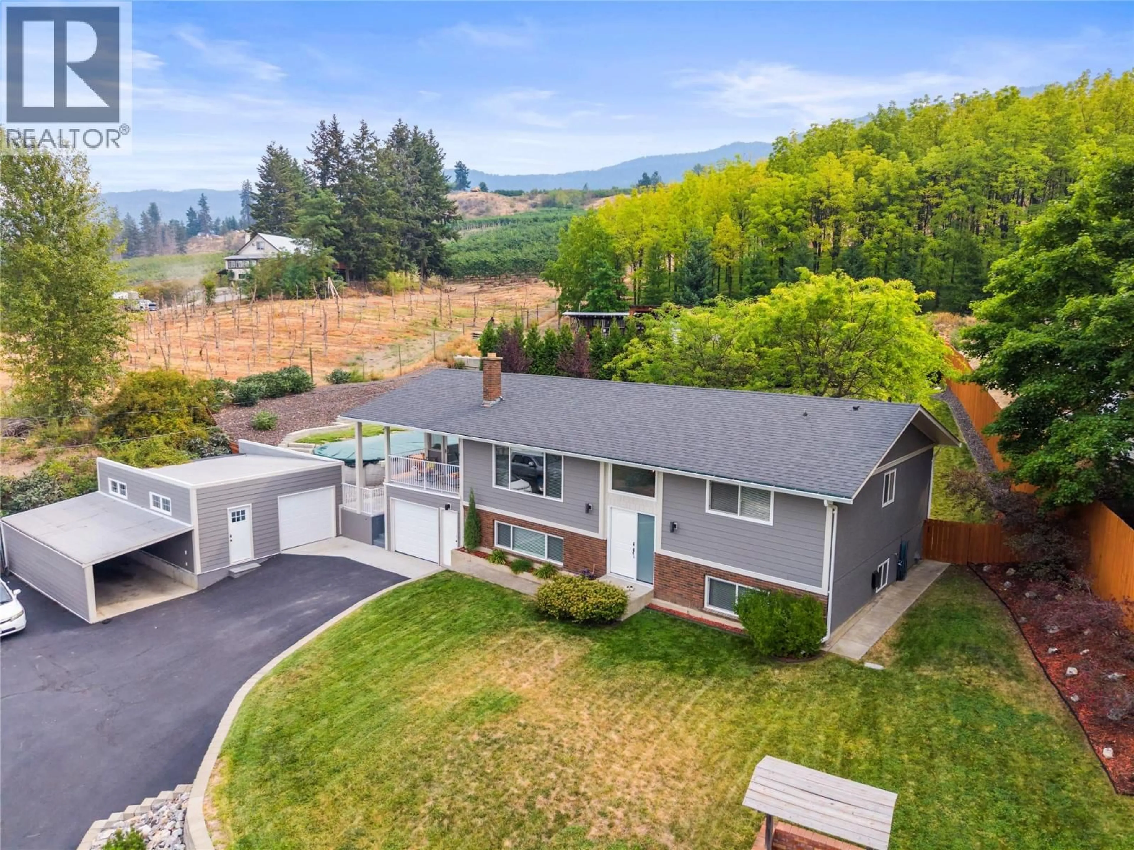 A pic from outside/outdoor area/front of a property/back of a property/a pic from drone, mountain view for 14487 OYAMA ROAD, Lake Country British Columbia V4V2C7