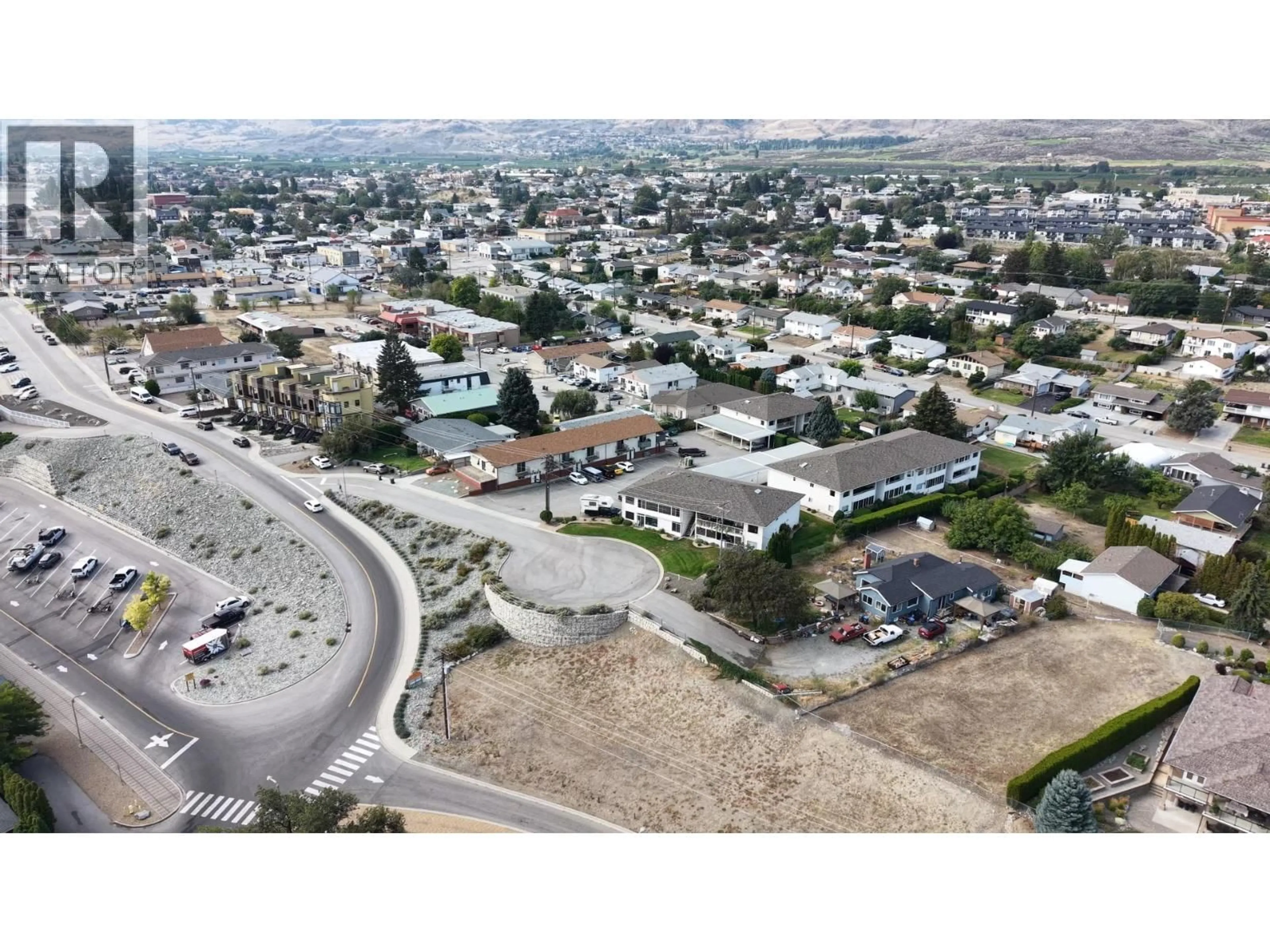 A pic from outside/outdoor area/front of a property/back of a property/a pic from drone, street for 11 - 42 FUJI COURT, Osoyoos British Columbia V0H1V0