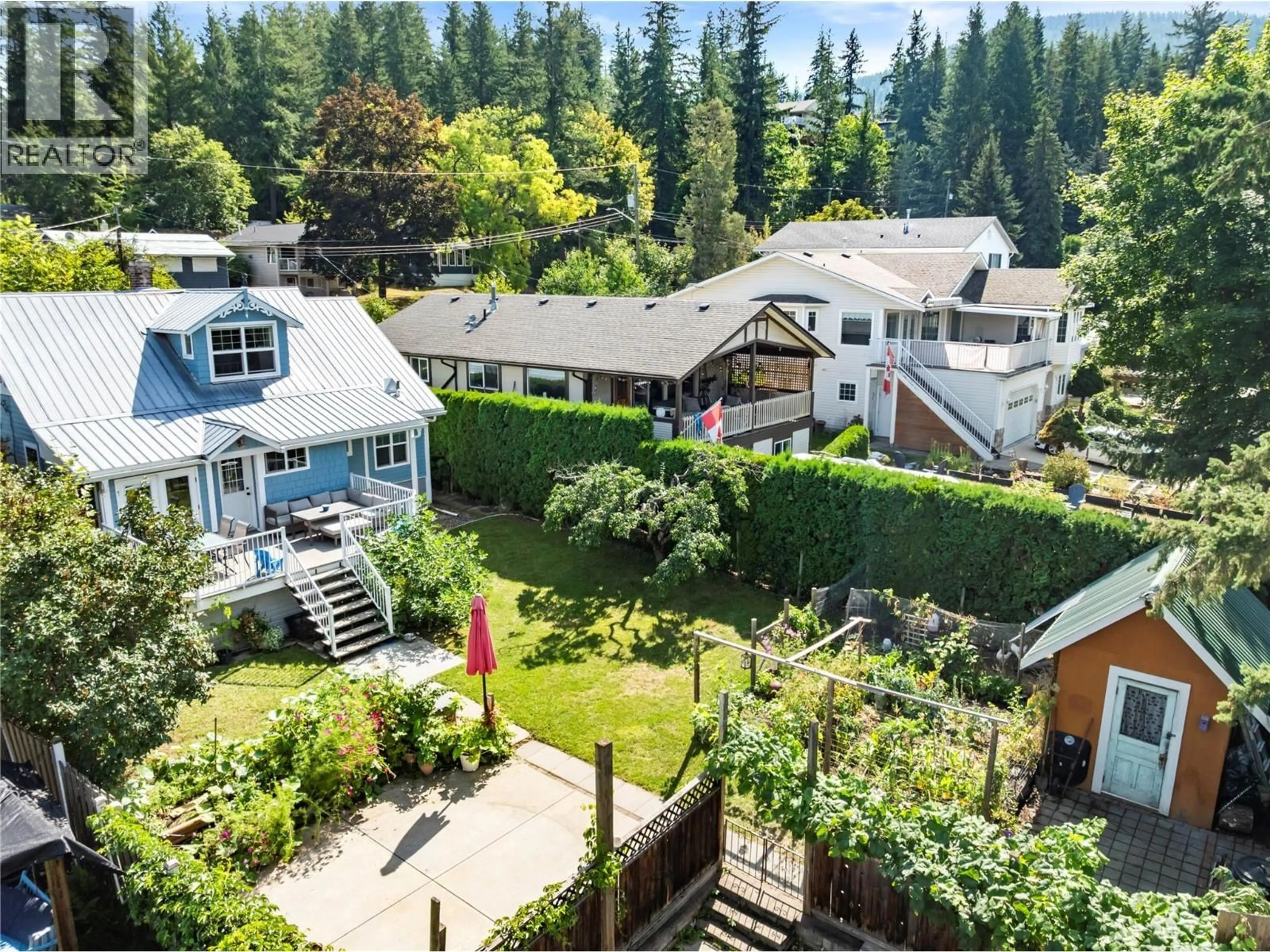 A pic from outside/outdoor area/front of a property/back of a property/a pic from drone, mountain view for 591 6 STREET SOUTHEAST, Salmon Arm British Columbia V1E4E5
