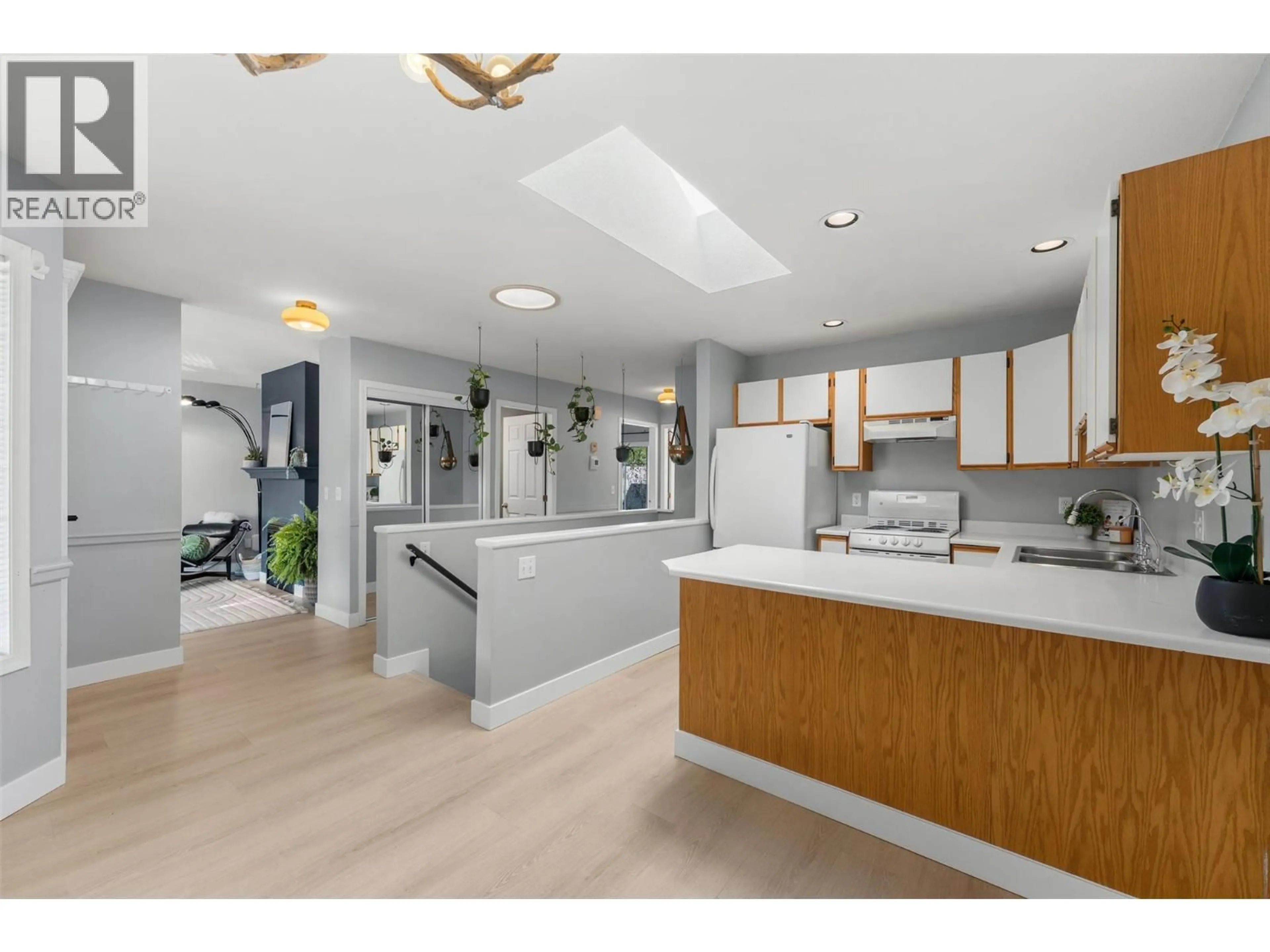 Open concept kitchen, ceramic/tile floor for 1 - 9159 GLENMORE ROAD, Lake Country British Columbia V4V1R4