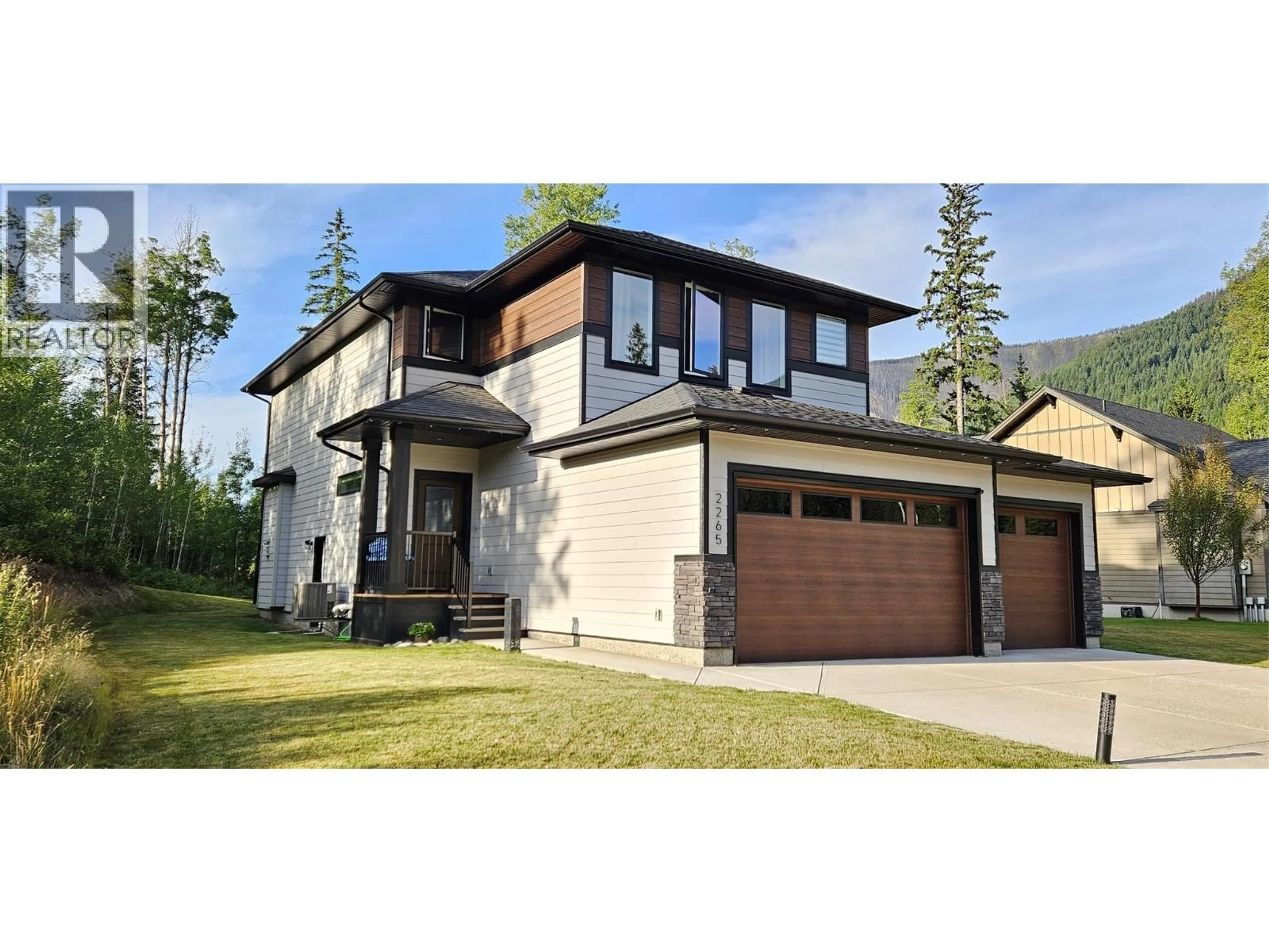 Home with vinyl exterior material, mountain view for 2265 BLACK HAWK DRIVE, Sparwood British Columbia V0B2G2