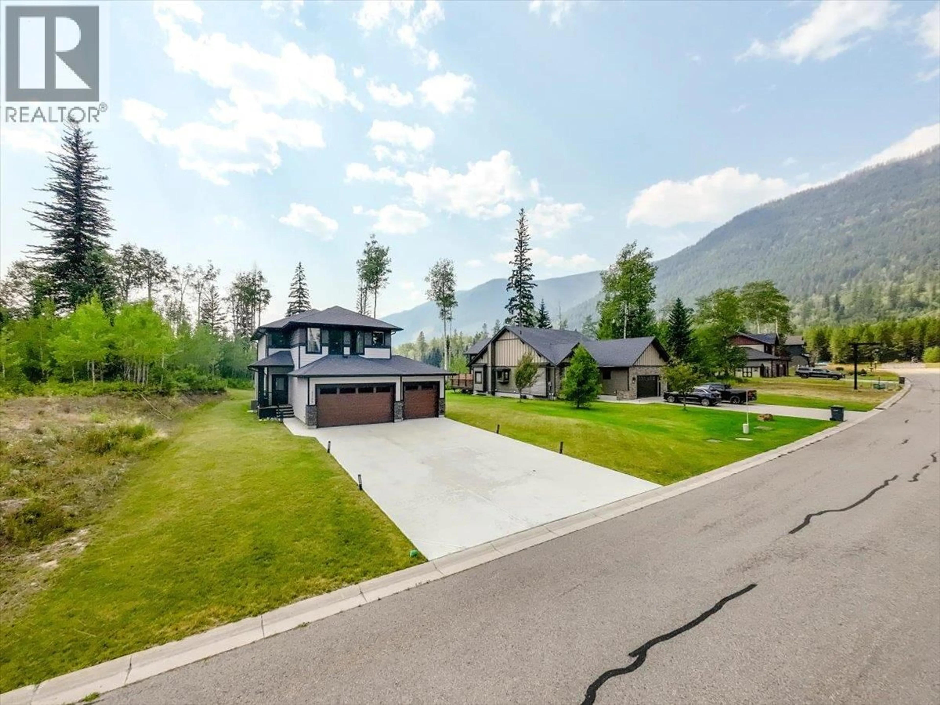 A pic from outside/outdoor area/front of a property/back of a property/a pic from drone, mountain view for 2265 BLACK HAWK DRIVE, Sparwood British Columbia V0B2G2