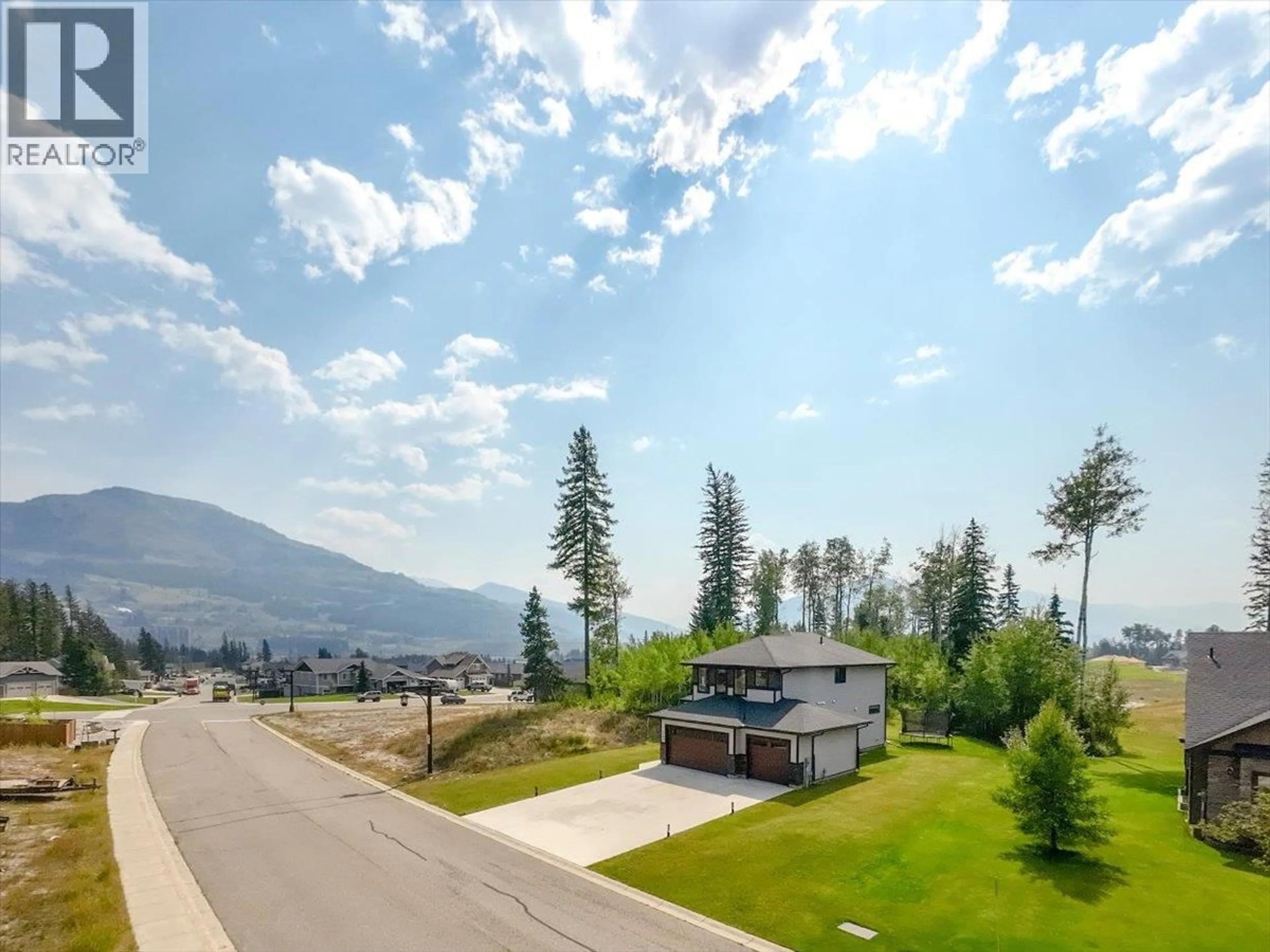 A pic from outside/outdoor area/front of a property/back of a property/a pic from drone, mountain view for 2265 BLACK HAWK DRIVE, Sparwood British Columbia V0B2G2