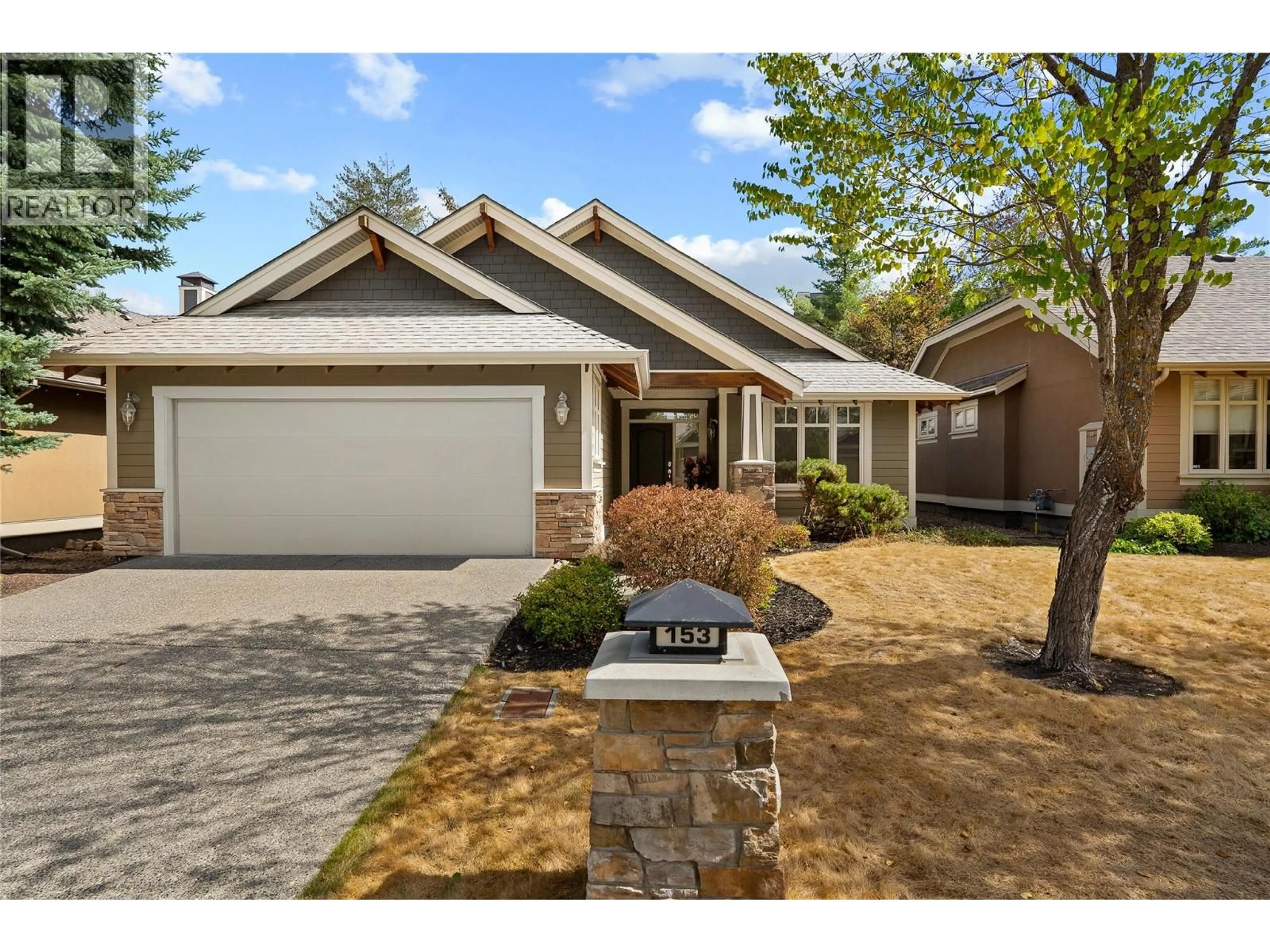 Home with vinyl exterior material, street for 153 MASHIE CRESCENT, Vernon British Columbia V1H1V8