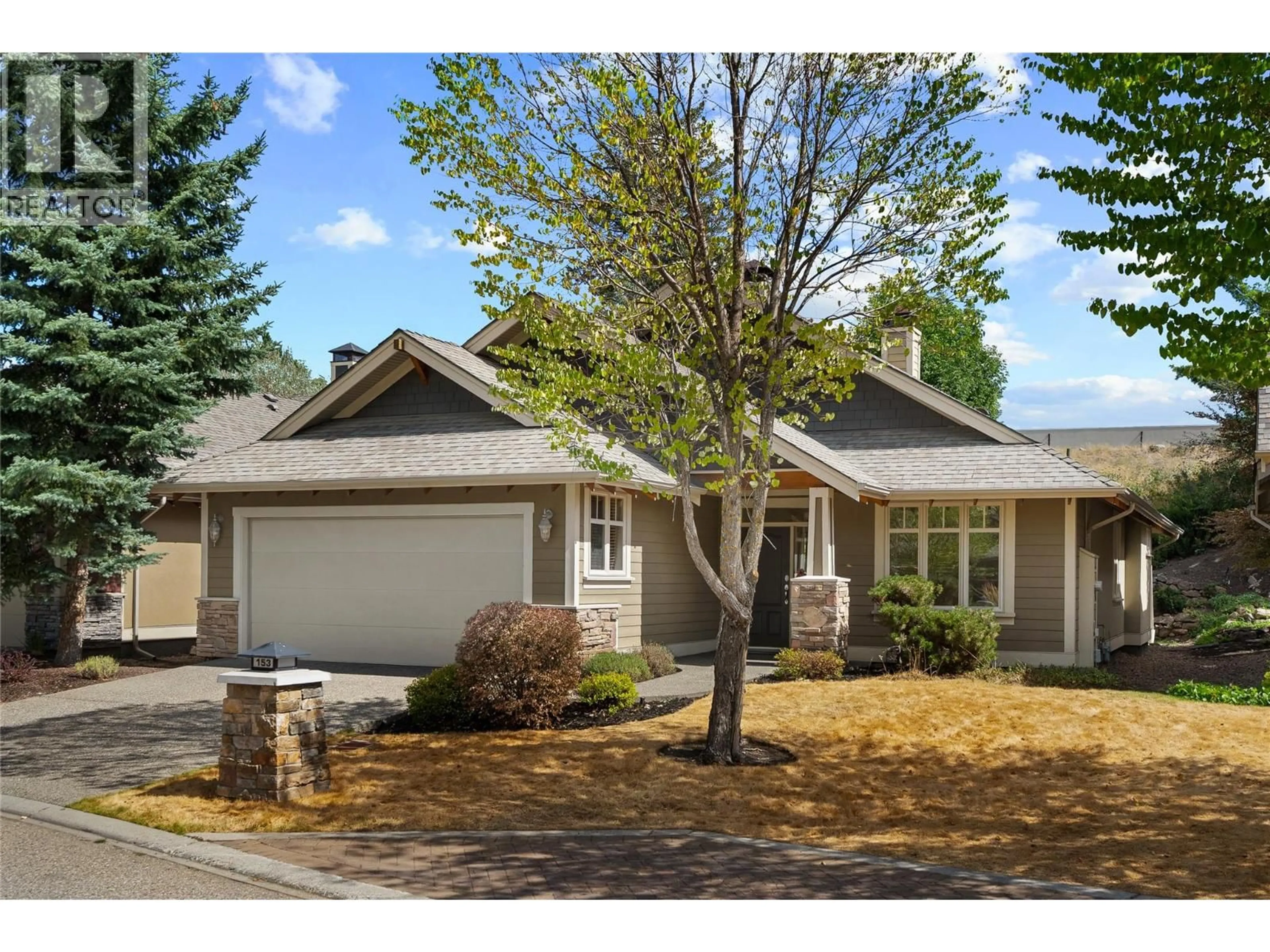 Home with vinyl exterior material, street for 153 MASHIE CRESCENT, Vernon British Columbia V1H1V8