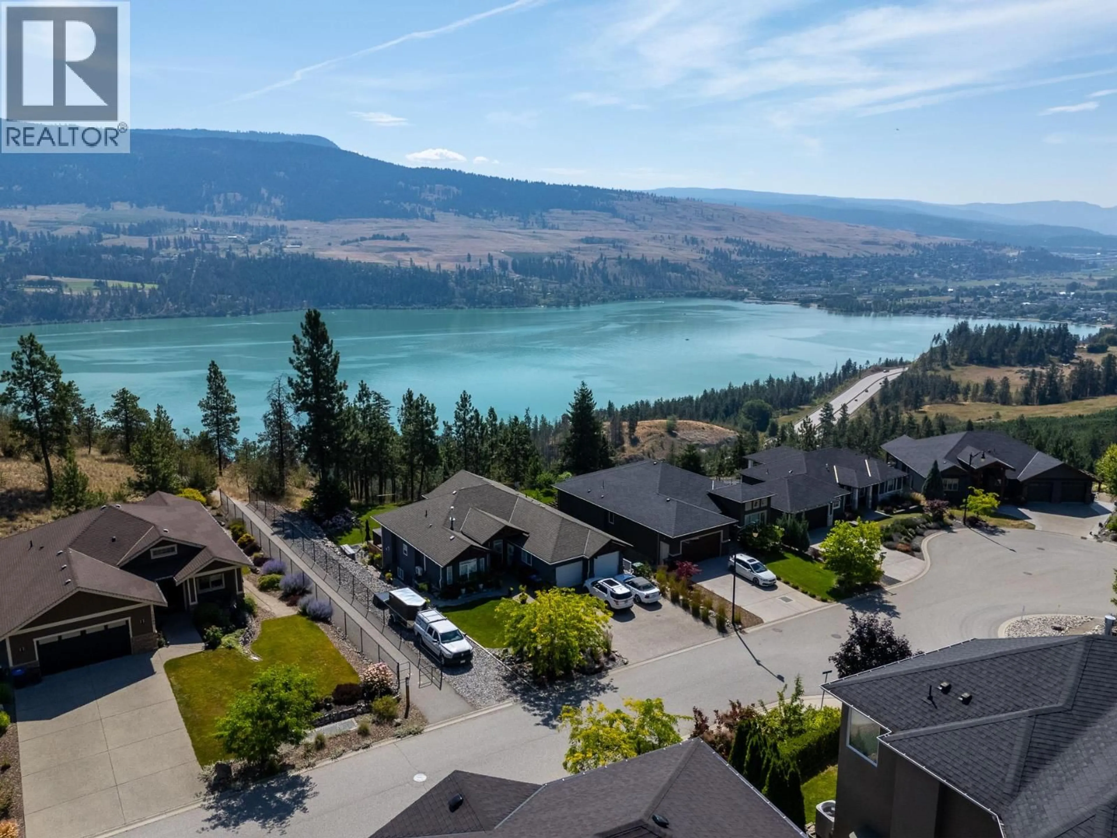 A pic from outside/outdoor area/front of a property/back of a property/a pic from drone, water/lake/river/ocean view for 12686 CLIFFSHORE DRIVE, Lake Country British Columbia V4V2P6