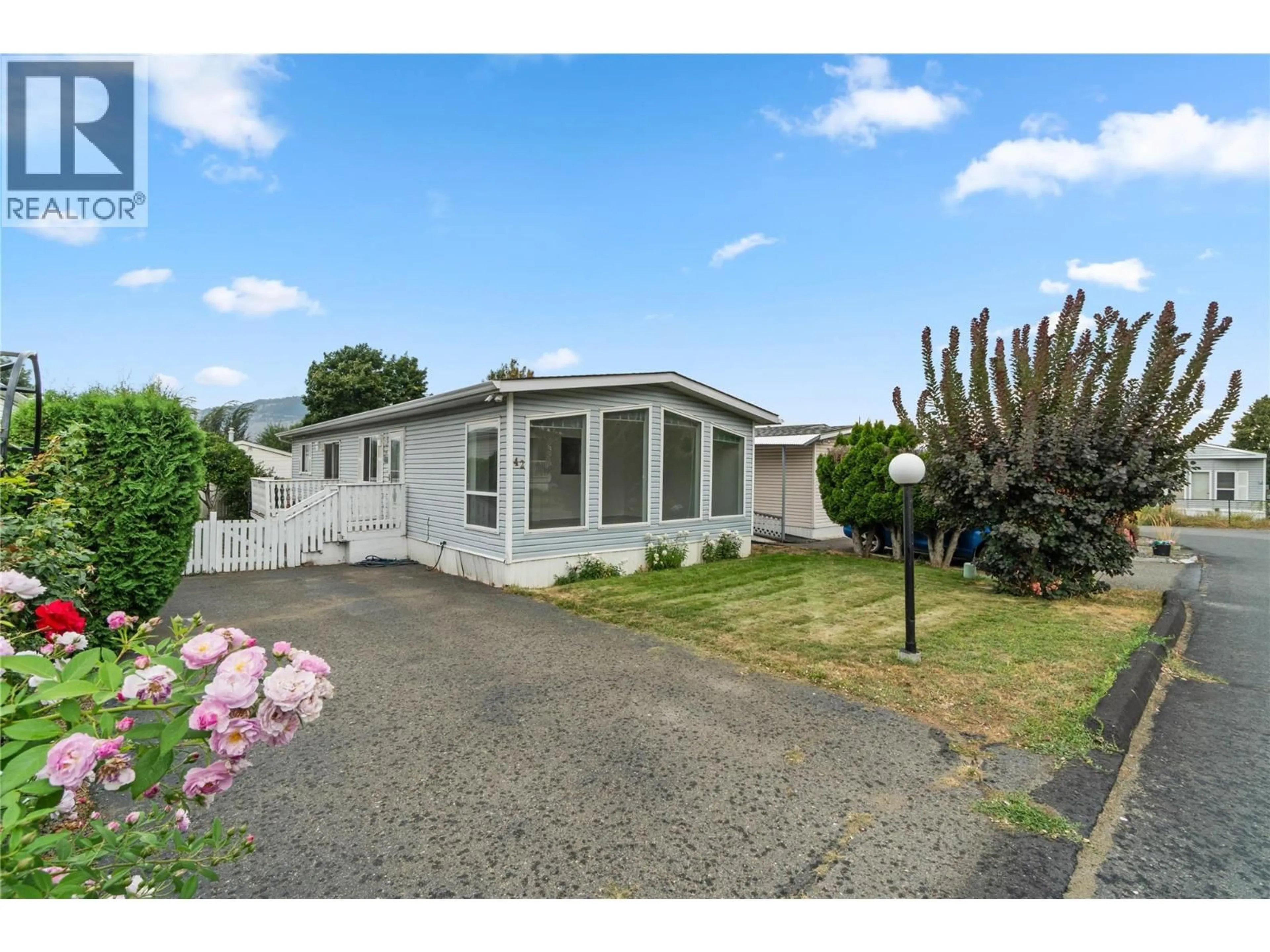 A pic from outside/outdoor area/front of a property/back of a property/a pic from drone, street for 42 - 1525 ORD ROAD, Kamloops British Columbia V2B7V2