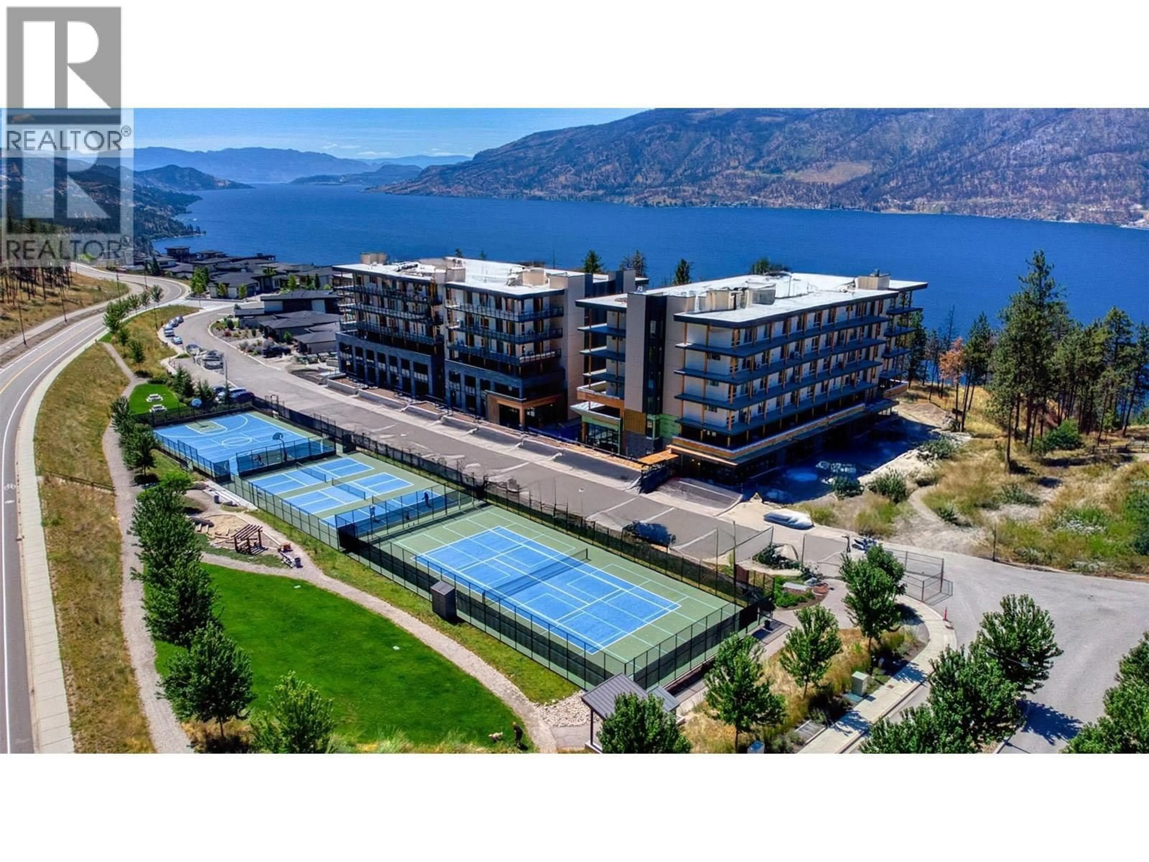 A pic from outside/outdoor area/front of a property/back of a property/a pic from drone, water/lake/river/ocean view for 306 - 9652 BENCHLAND DRIVE, Lake Country British Columbia V4V0C4