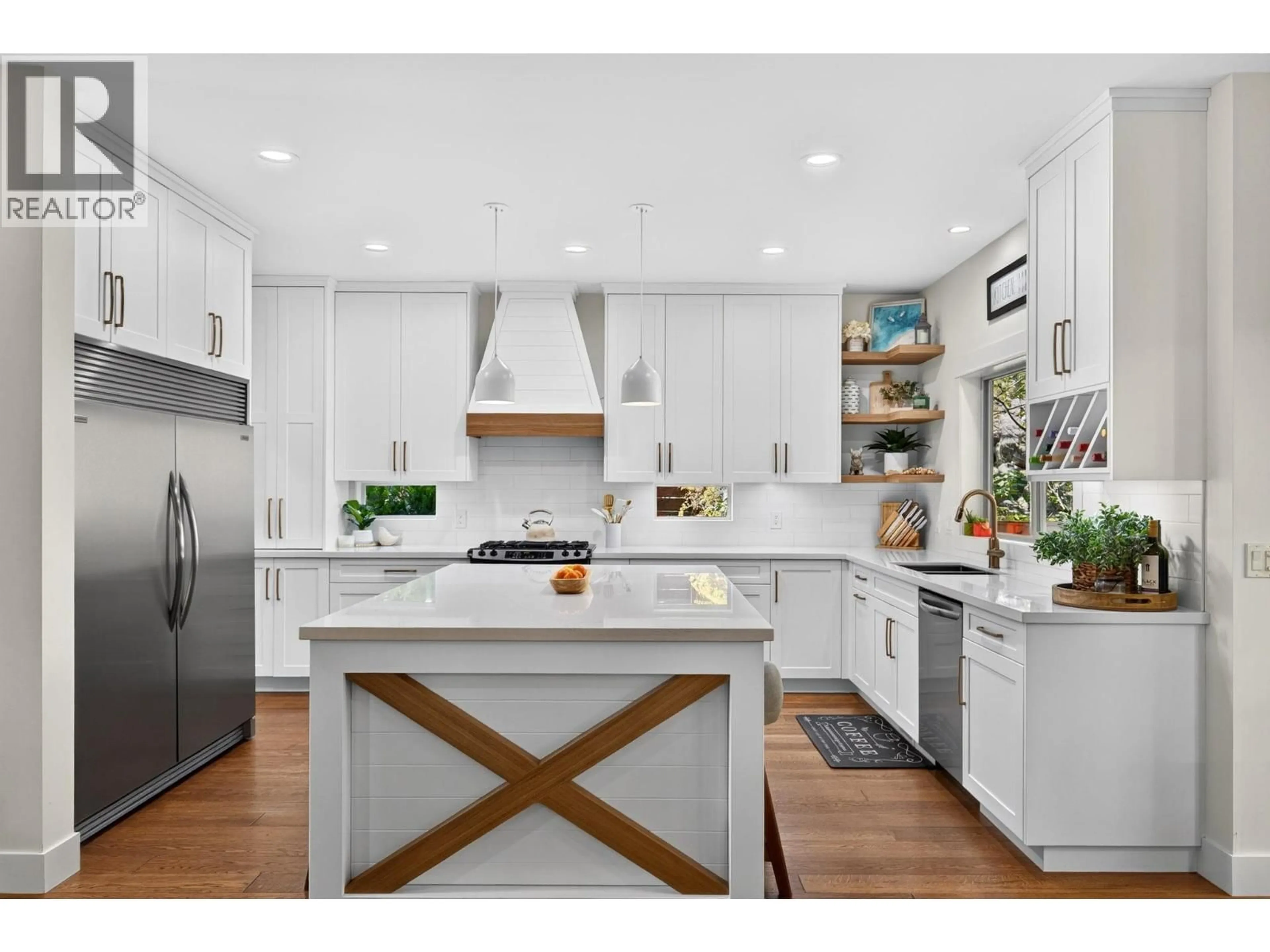 Open concept kitchen, wood/laminate floor for 178 TERRACE HILL COURT, Kelowna British Columbia V1V2T2