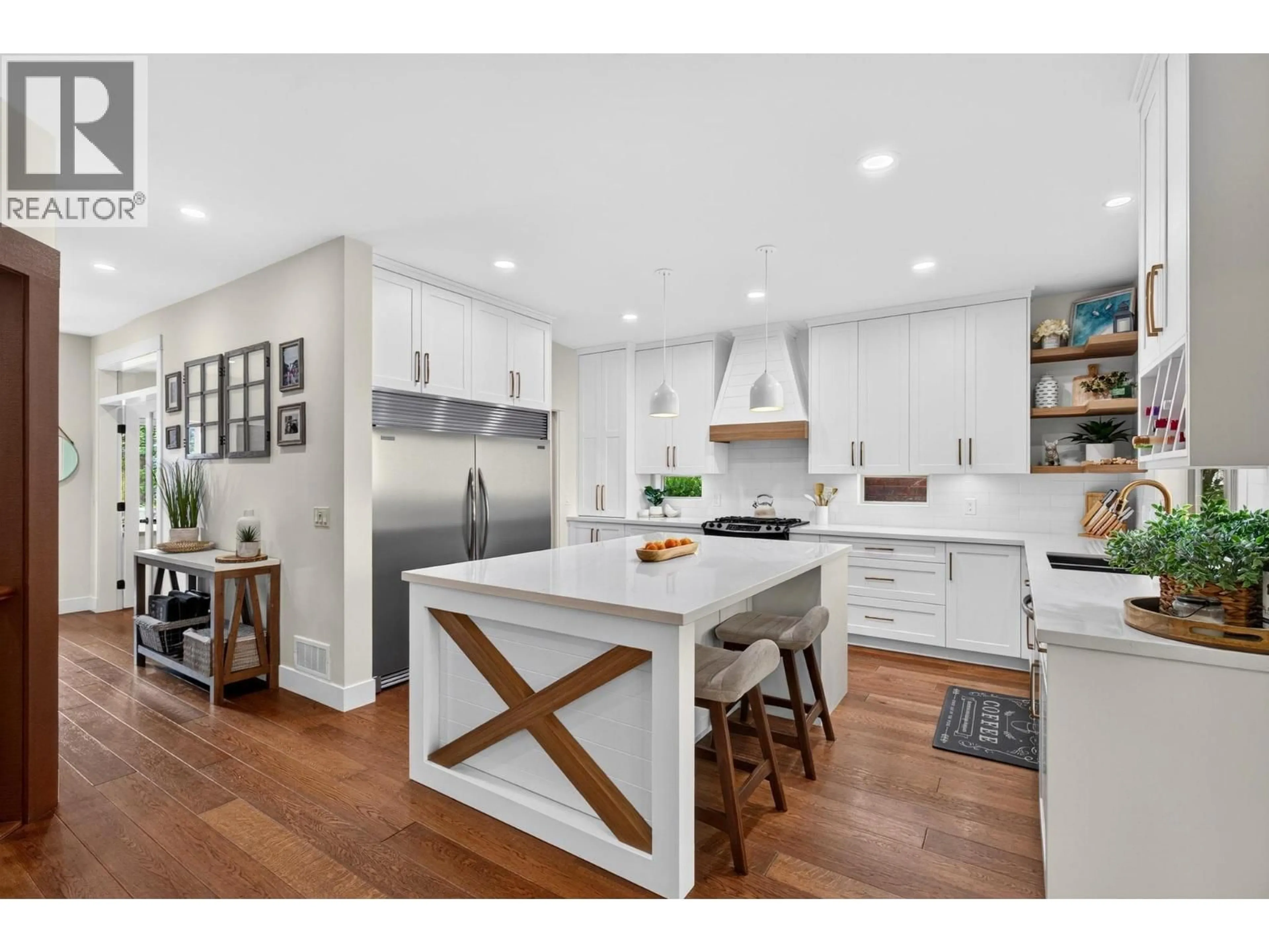 Open concept kitchen, wood/laminate floor for 178 TERRACE HILL COURT, Kelowna British Columbia V1V2T2