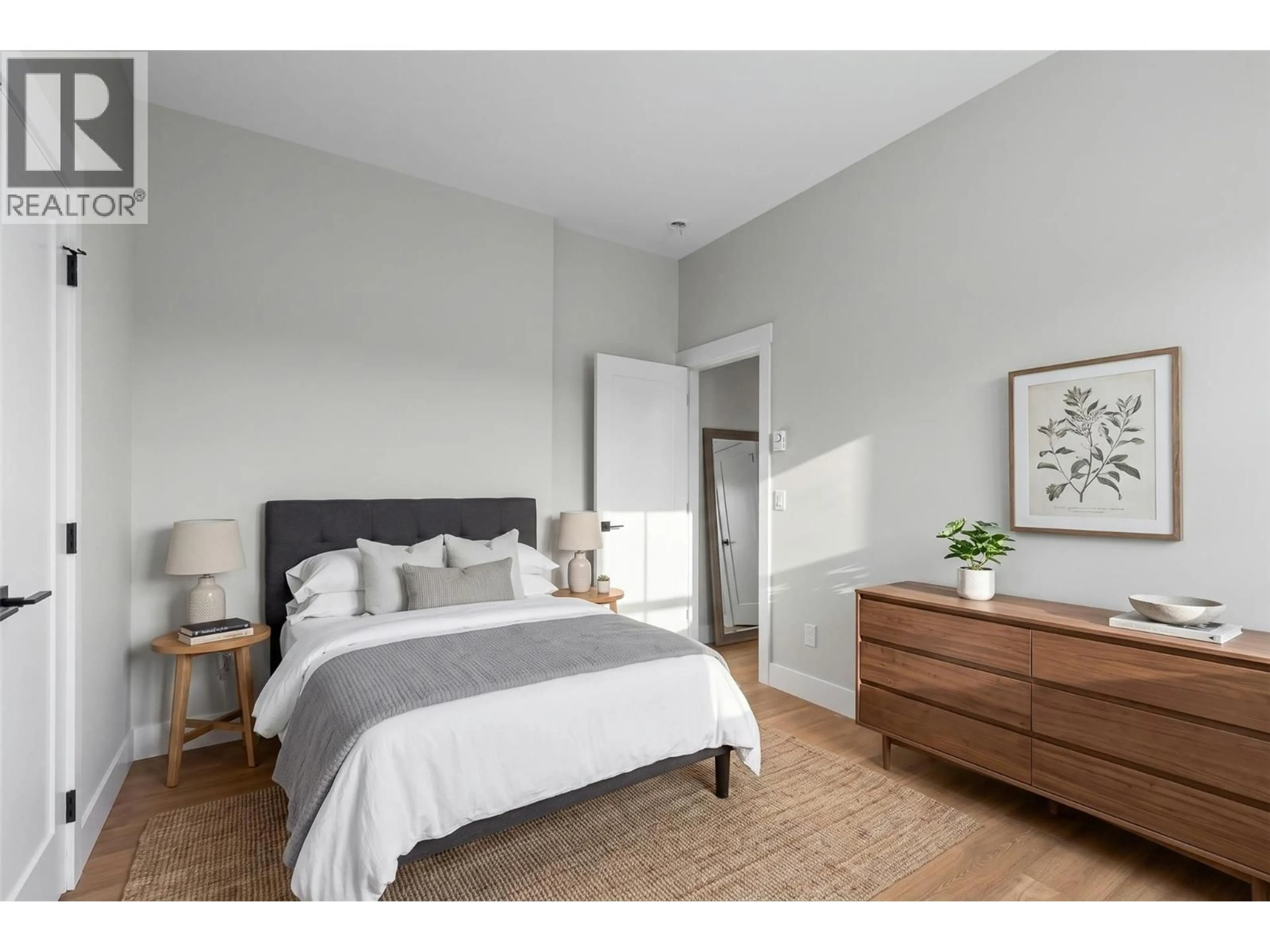 Bedroom with bed, wood/laminate floor for 2531 PINNACLE RIDGE DRIVE, West Kelowna British Columbia V4T0G4