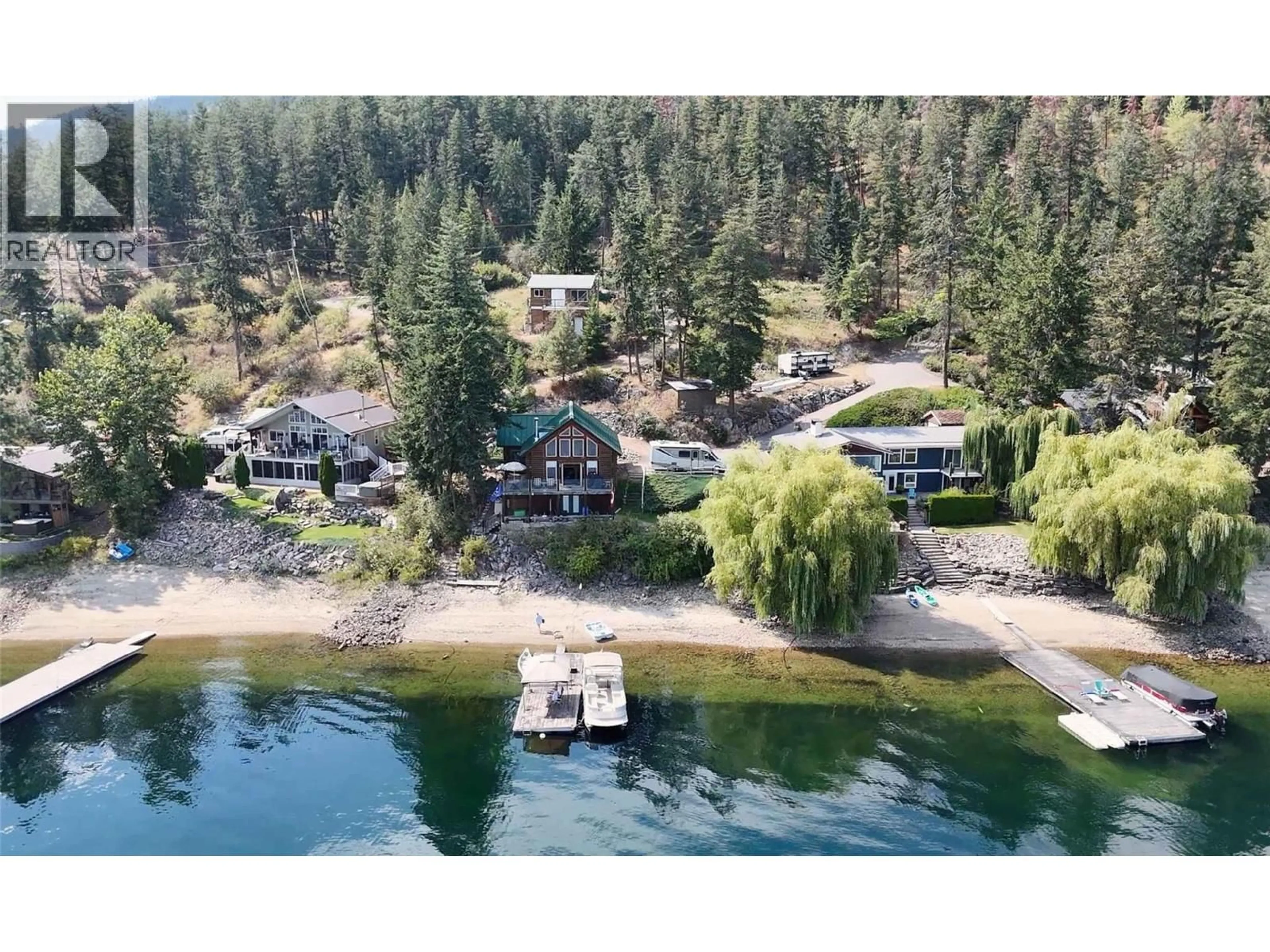 A pic from outside/outdoor area/front of a property/back of a property/a pic from drone, water/lake/river/ocean view for 957 LITTLE SHUSWAP LAKE ROAD, Chase British Columbia V0E1M2