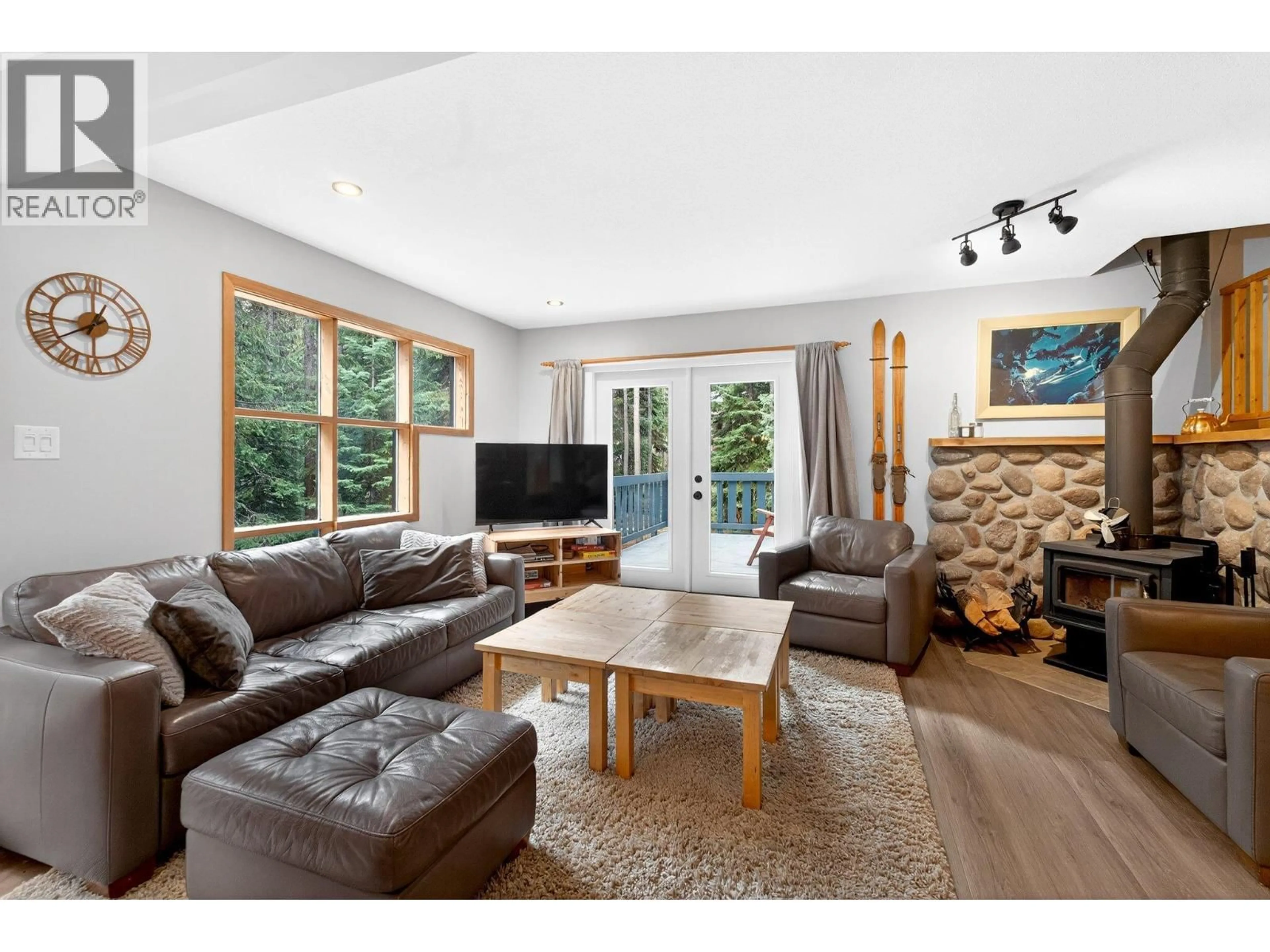 Living room with furniture, wood/laminate floor for 102 - 103 WHITETAIL ROAD, Apex Mountain British Columbia V2A0E2