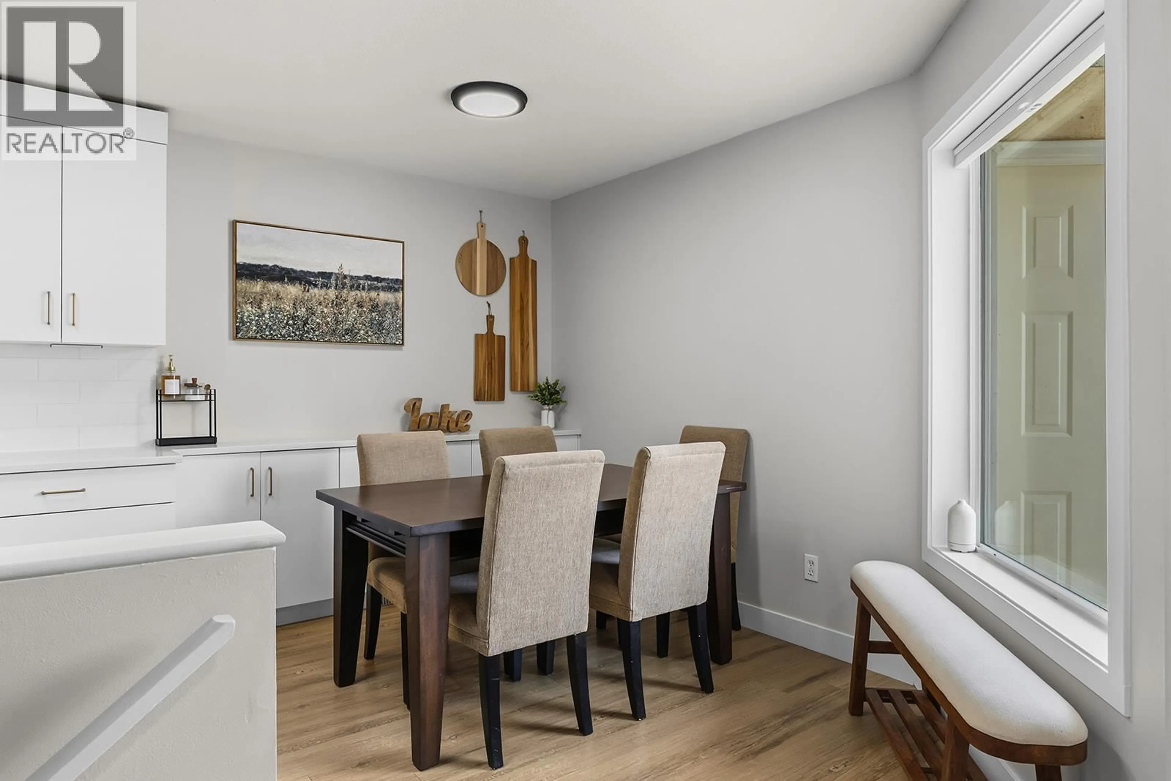 Dining room, wood/laminate floor for 3 - 9159 GLENMORE ROAD, Lake Country British Columbia V4V1R4