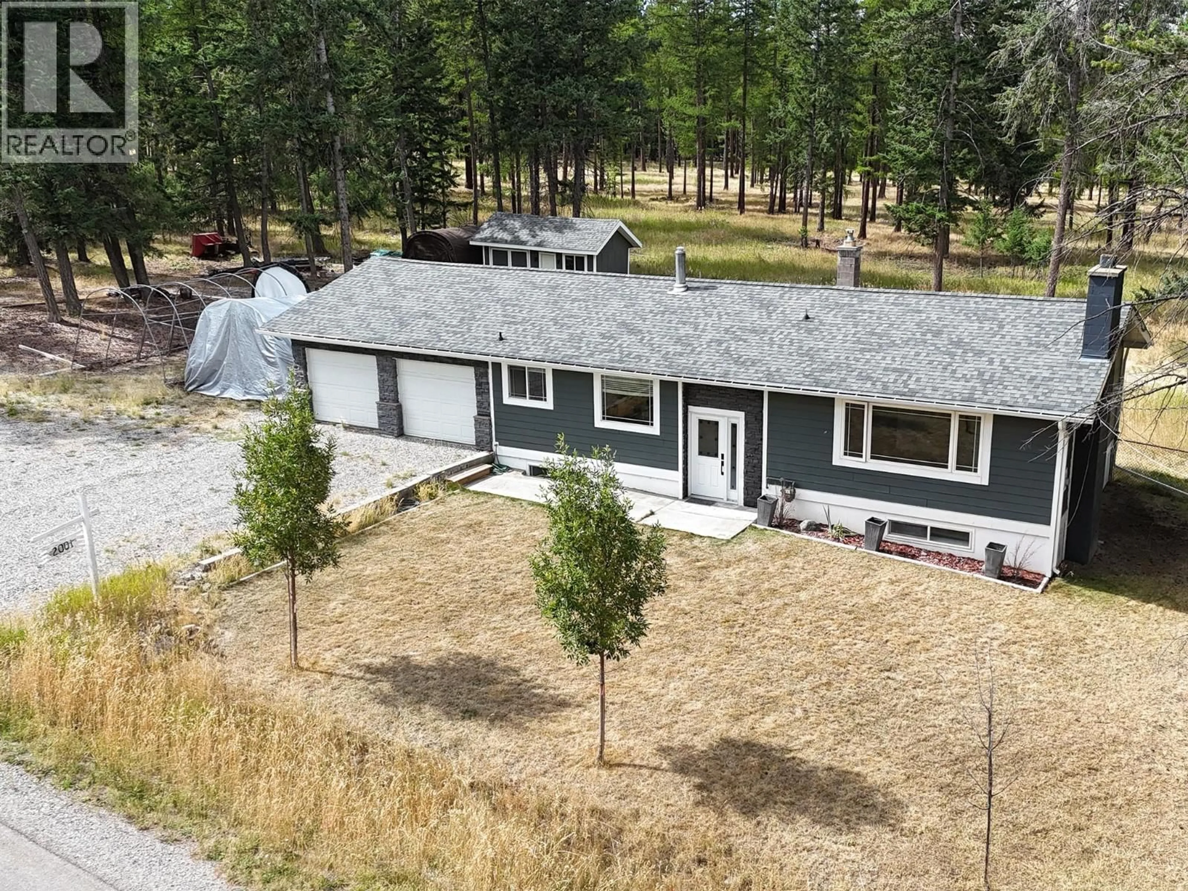 A pic from outside/outdoor area/front of a property/back of a property/a pic from drone, forest/trees view for 2001 8TH AVENUE SOUTH, Cranbrook British Columbia V1C7E7