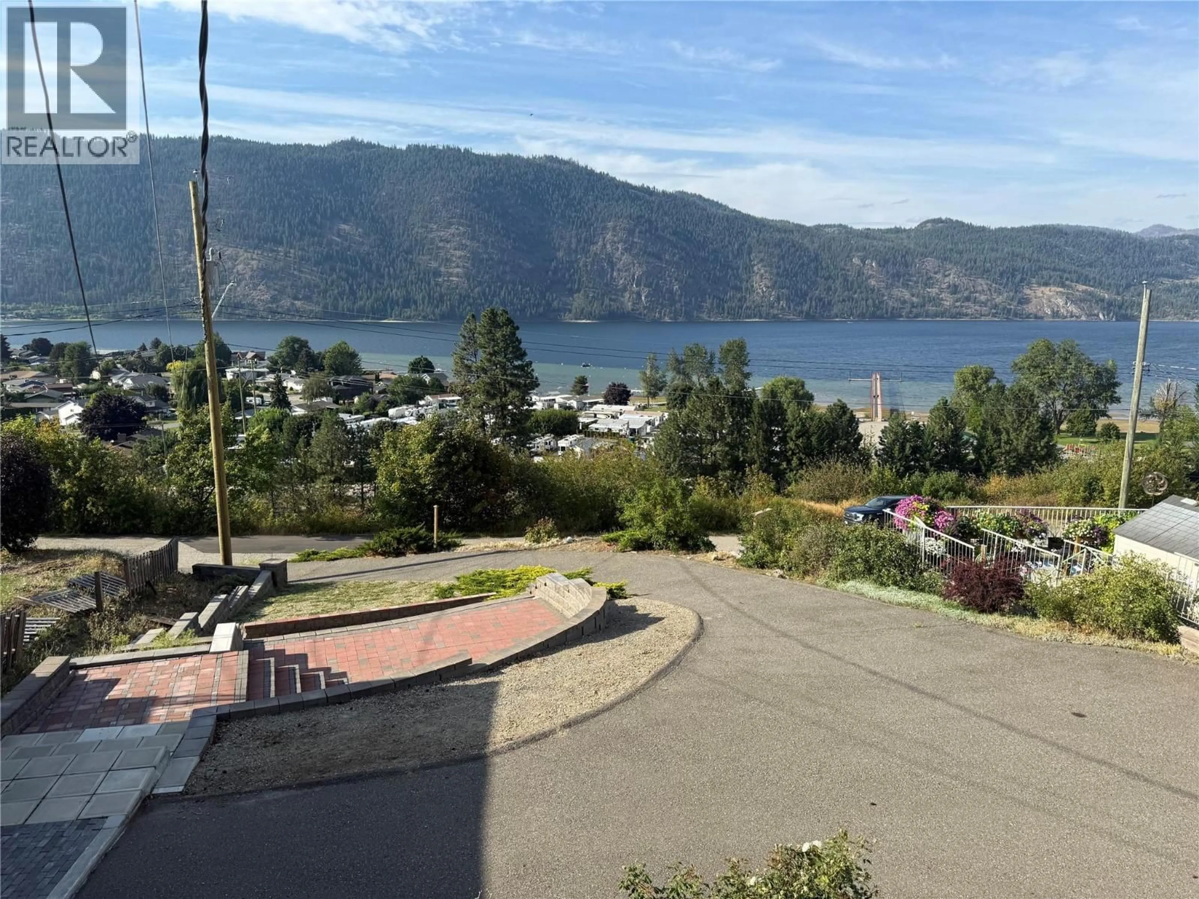 A pic from outside/outdoor area/front of a property/back of a property/a pic from drone, water/lake/river/ocean view for 1225 BAY DRIVE, Chase British Columbia V0E1M0