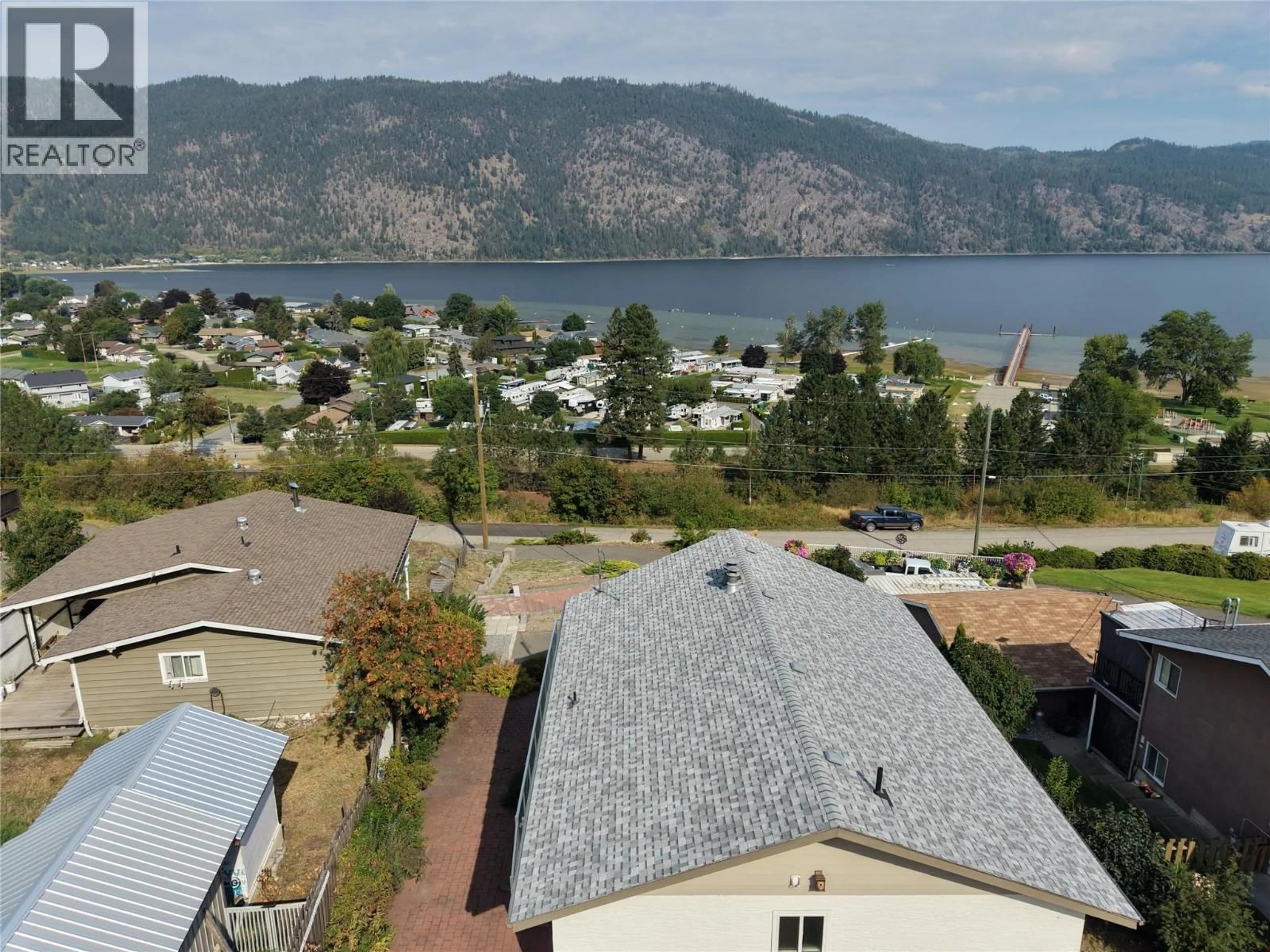 A pic from outside/outdoor area/front of a property/back of a property/a pic from drone, water/lake/river/ocean view for 1225 BAY DRIVE, Chase British Columbia V0E1M0
