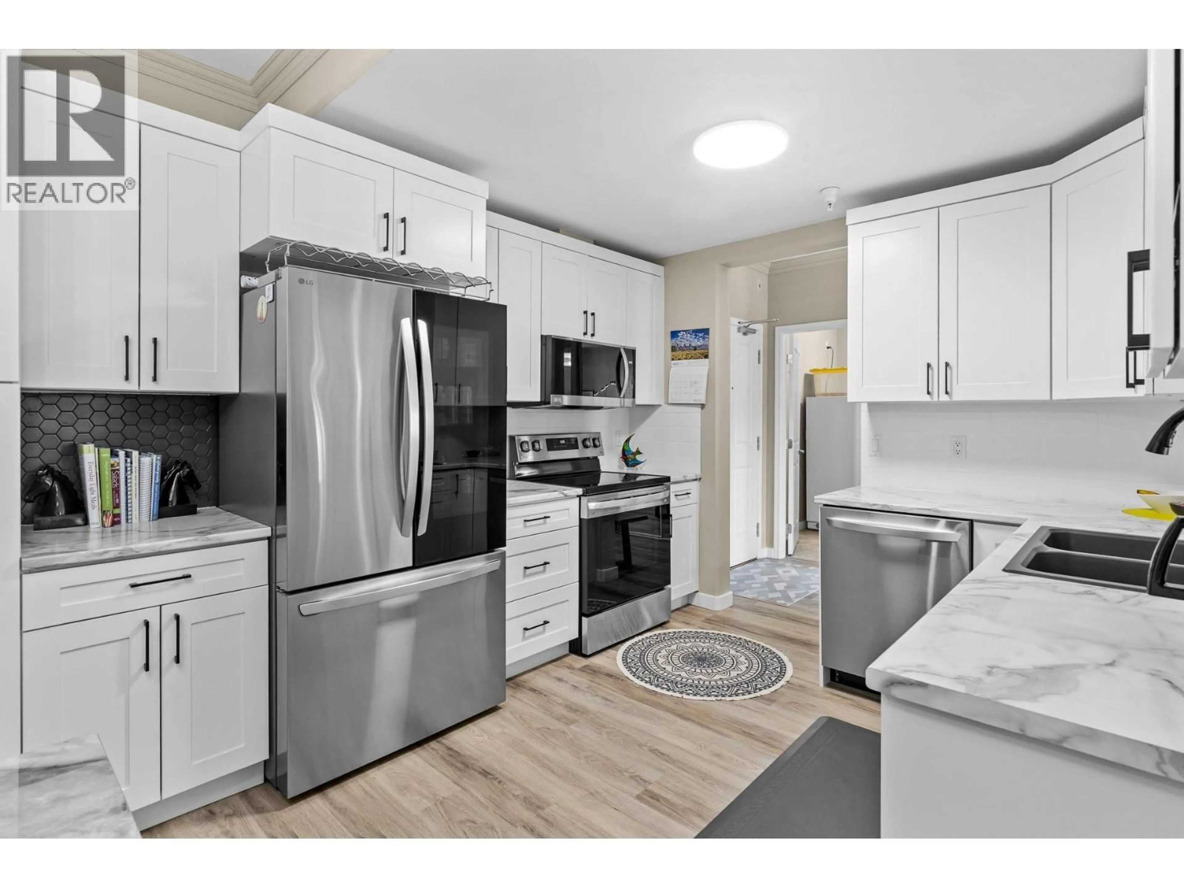 Open concept kitchen, unknown for 305 - 1960 ENTERPRISE WAY, Kelowna British Columbia V1Y9S5