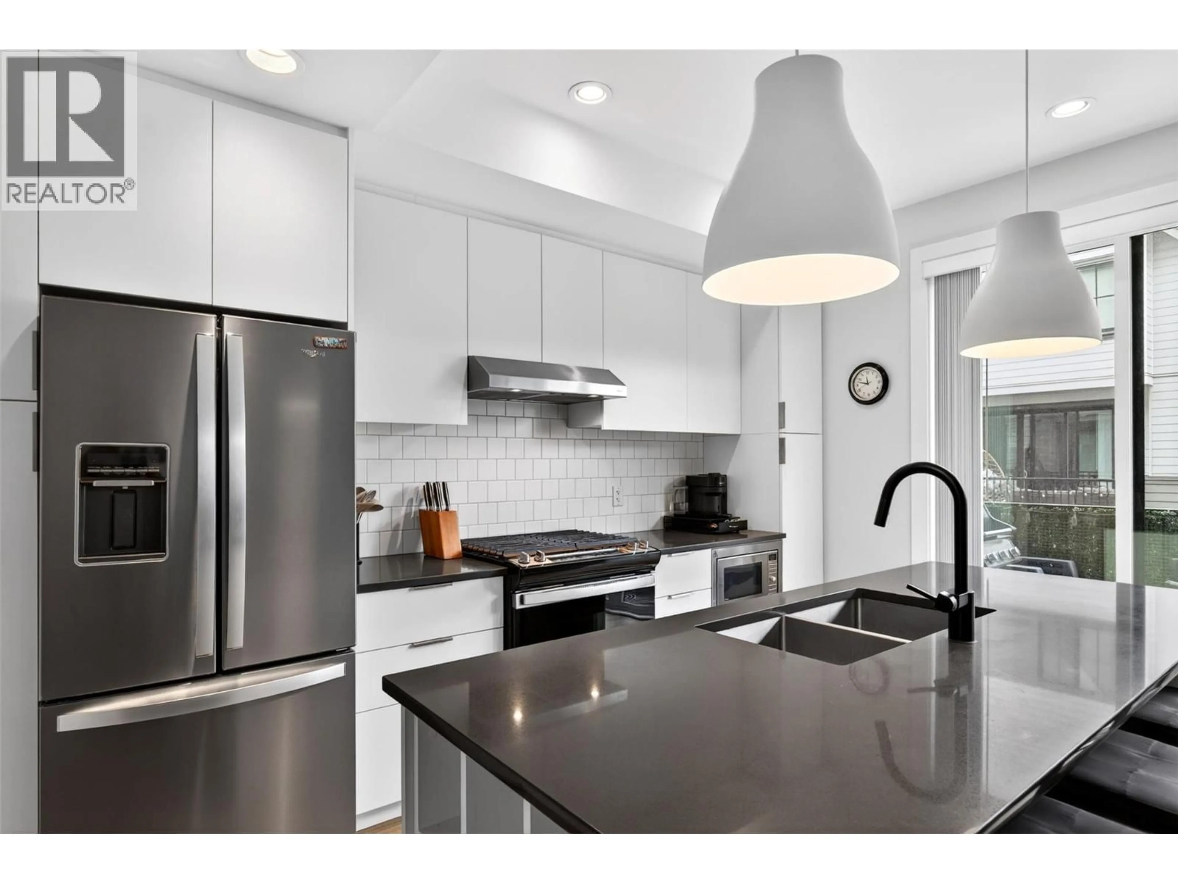 Open concept kitchen, ceramic/tile floor for 32 - 307 GLEN PARK DRIVE, Kelowna British Columbia V1V0H1