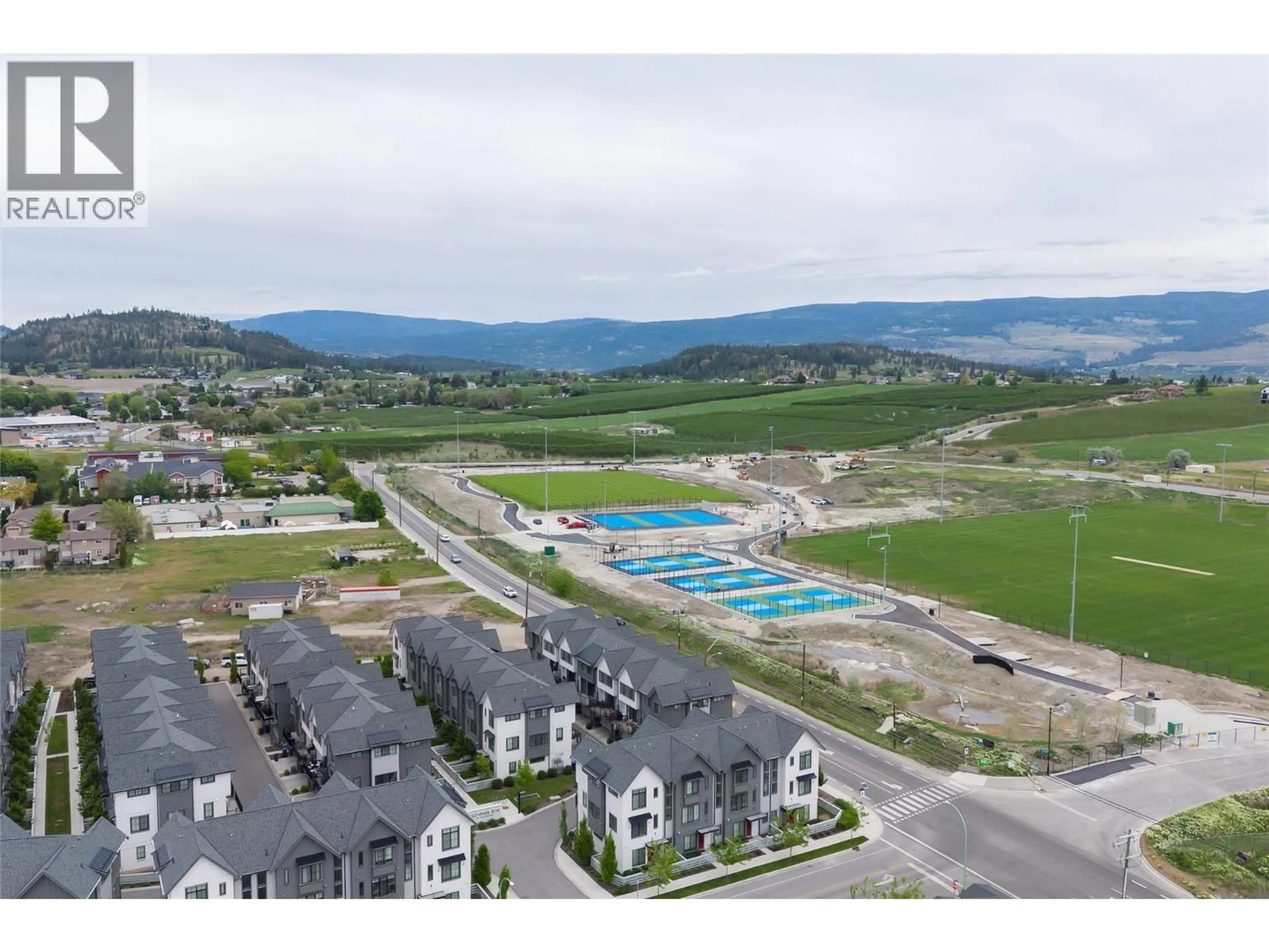 A pic from outside/outdoor area/front of a property/back of a property/a pic from drone, mountain view for 32 - 307 GLEN PARK DRIVE, Kelowna British Columbia V1V0H1
