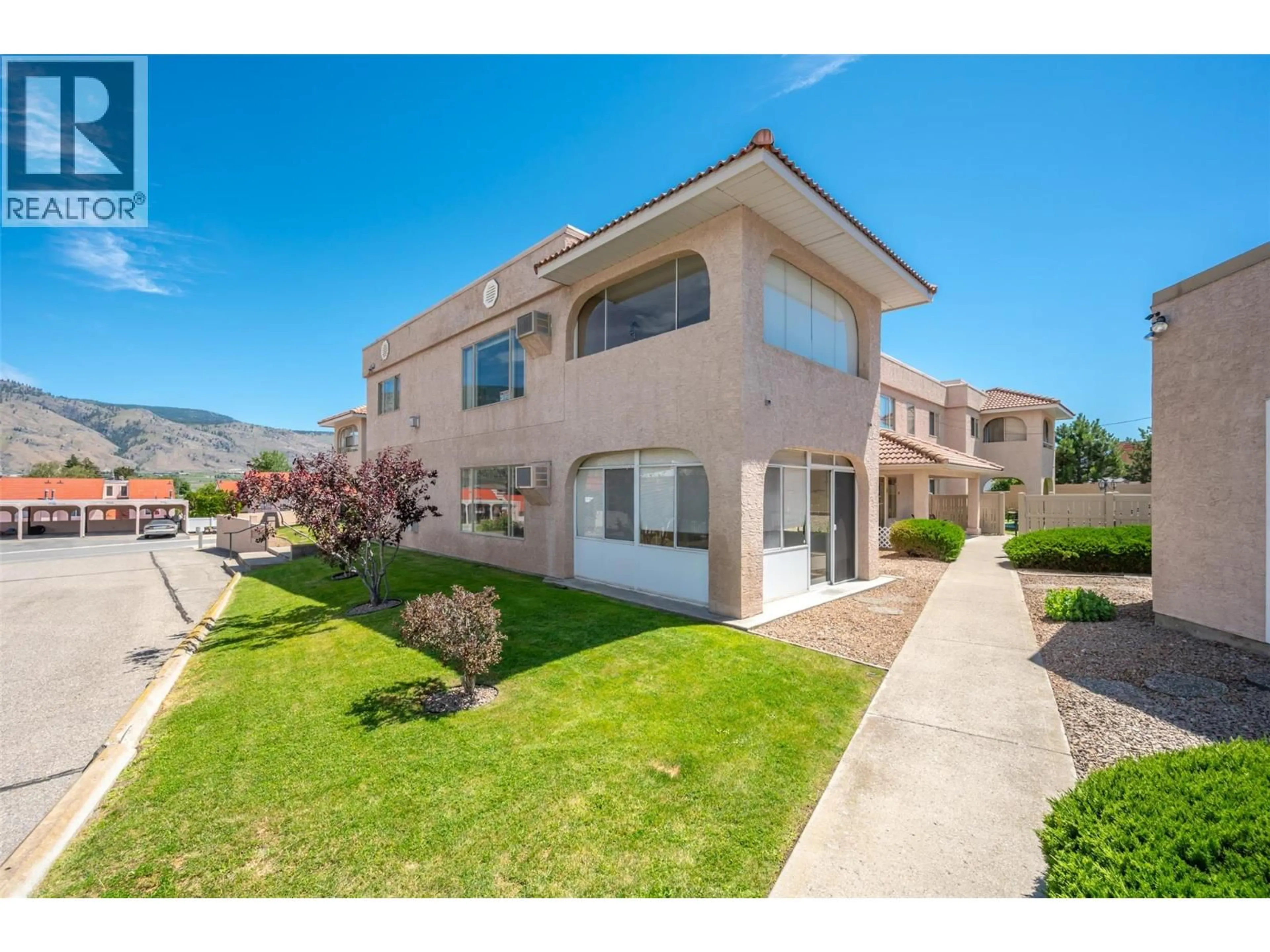 A pic from outside/outdoor area/front of a property/back of a property/a pic from drone, unknown for 101A - 8006 VEDETTE DRIVE, Osoyoos British Columbia V0H1V2