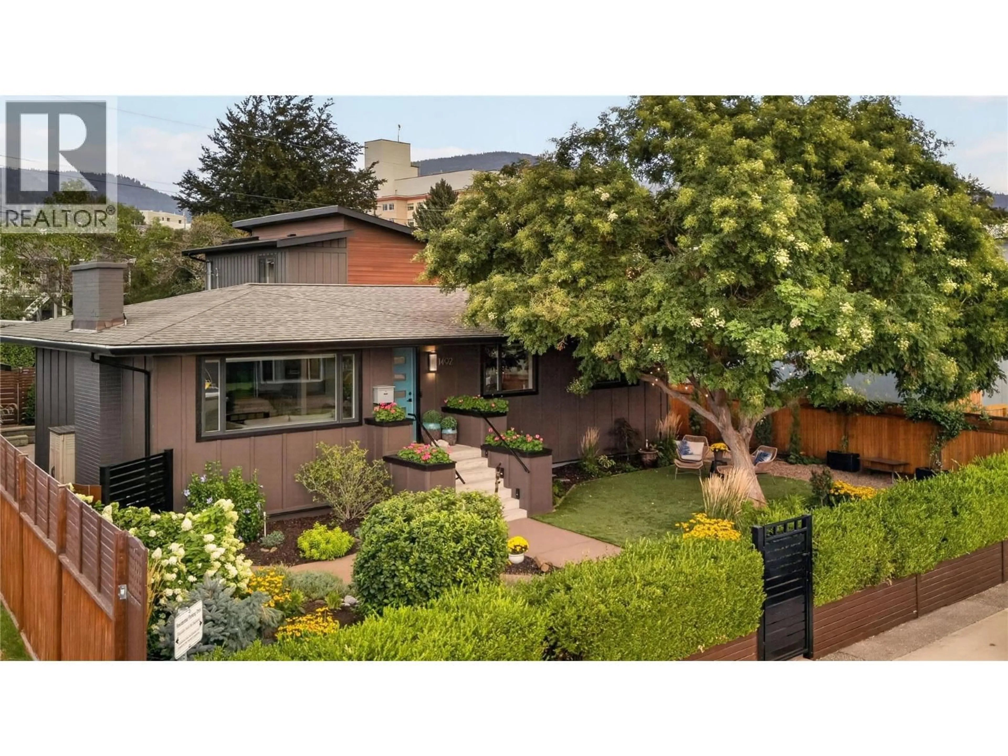 A pic from outside/outdoor area/front of a property/back of a property/a pic from drone, street for 1492 LEIR STREET, Penticton British Columbia V2A4Z5